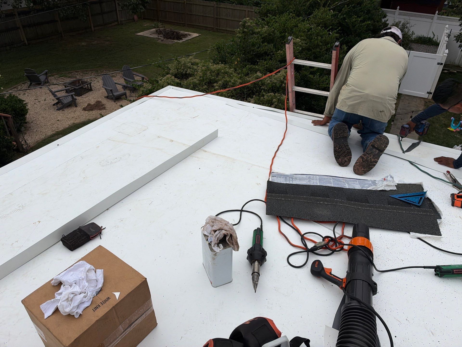 Richmond Roof Replacement Including Flat Membrane and Asphalt Shingles by Cade Construction