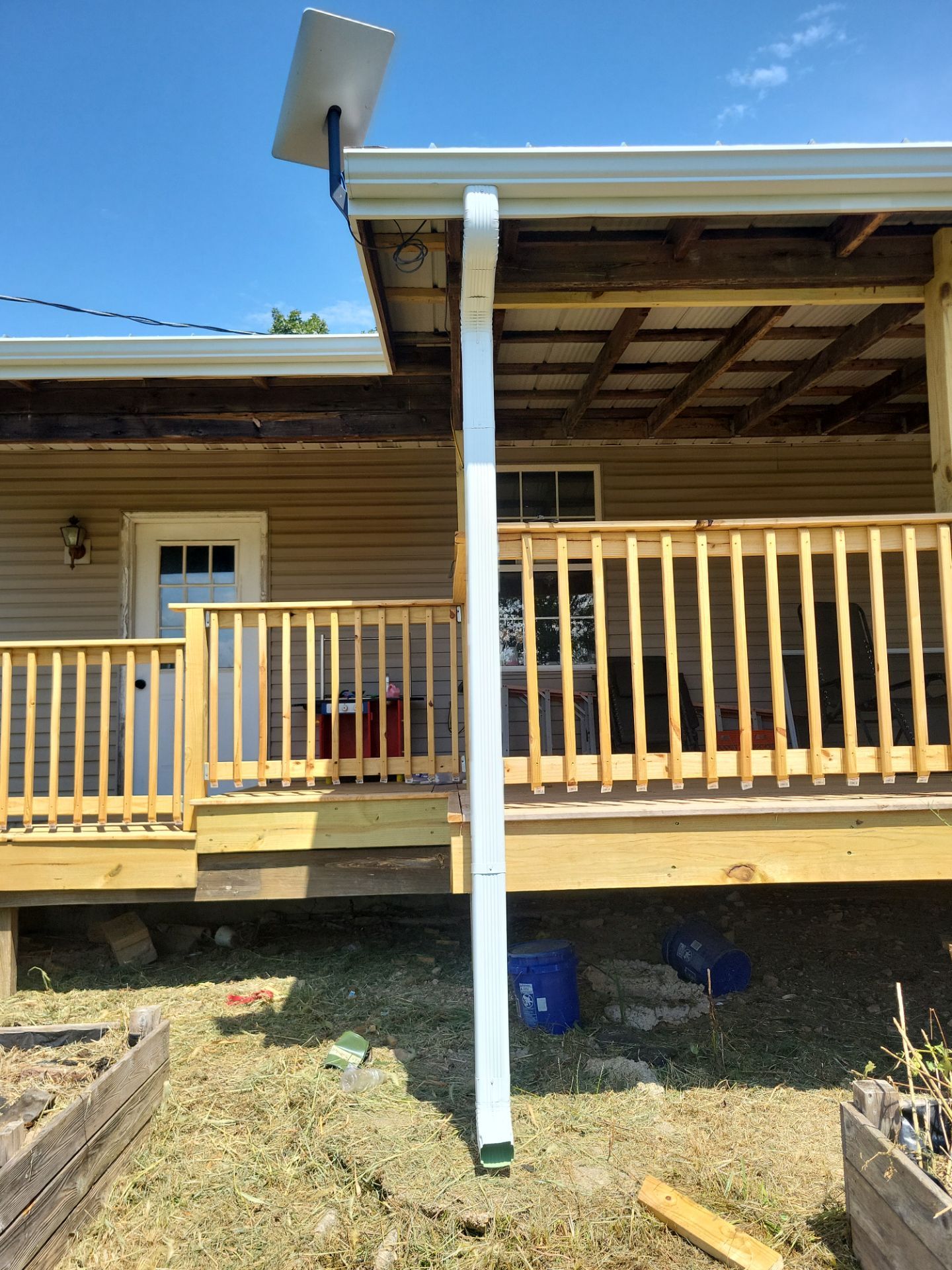 Residential Roof + Gutters & Downspouts & Gutter Covers Install  by Titan Commercial & Residential Roofing 