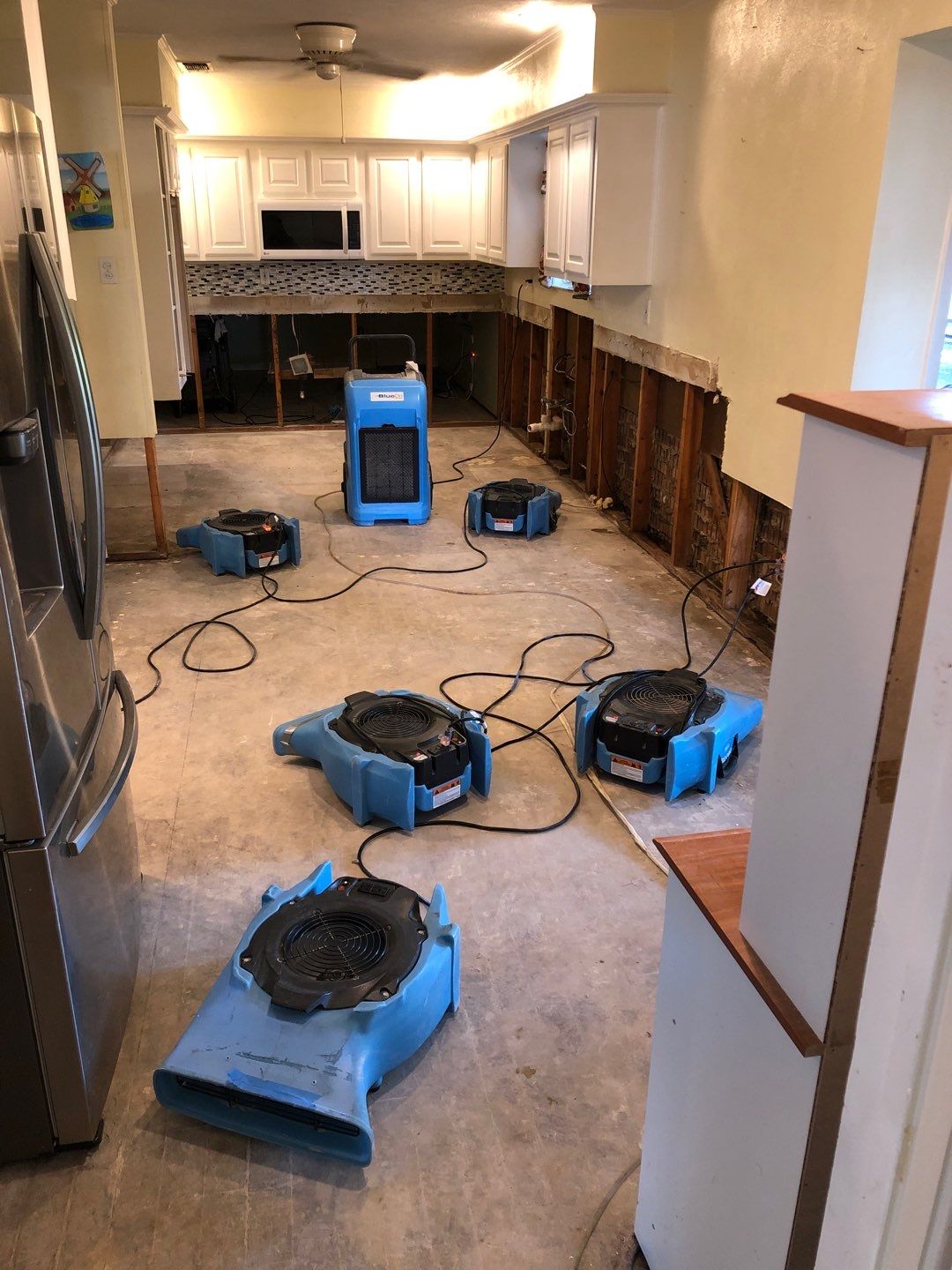 Home Remodel after Huge Water Damage by L&T General Contractors and Restoration INC