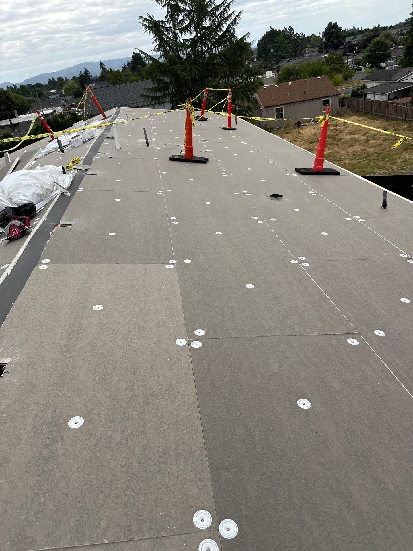 Commercial Flat Roof Installation using GAF 60Mil TPO  by Orezona Building & Roofing Company, Inc.