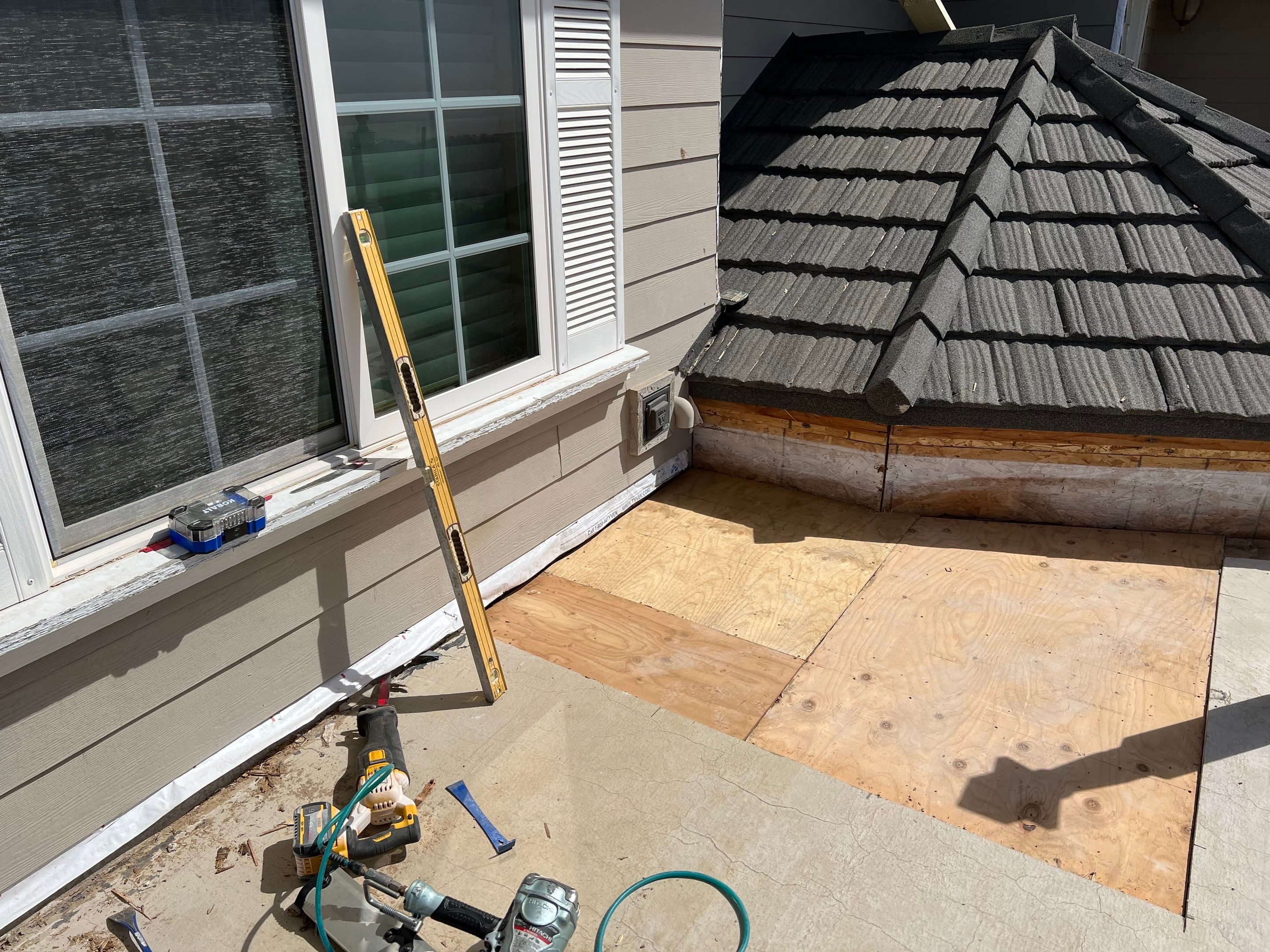 Sealant system over walk deck over house using Rubber coat and coatings by Straight Edge Roofing Inc