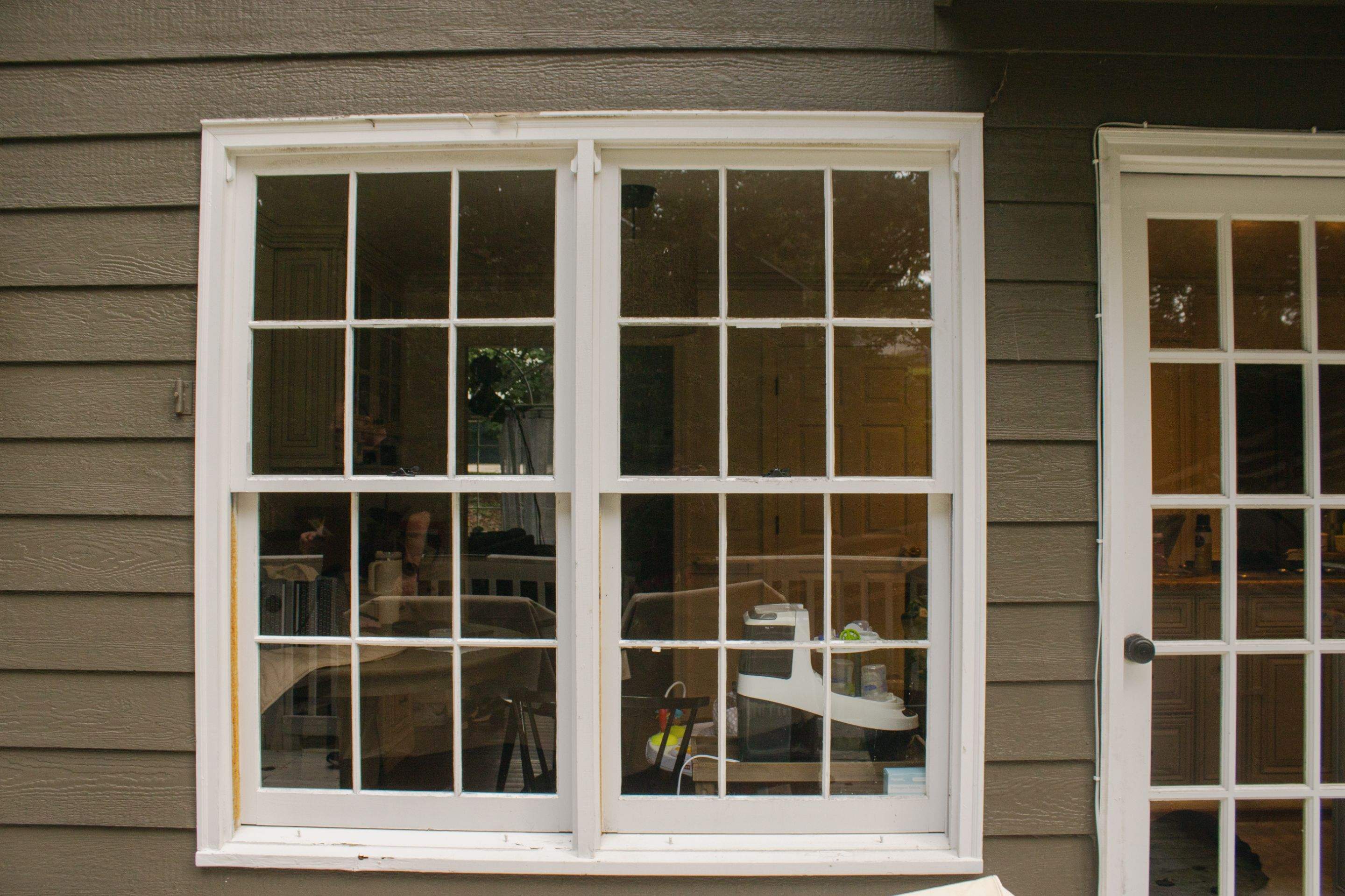 Marietta, GA Full Siding Replacement, 30+ Window Replacements, Screened-In Porch to Sunroom Conversion, Gutter Replacement, and Exterior Painting by Nelson Exteriors