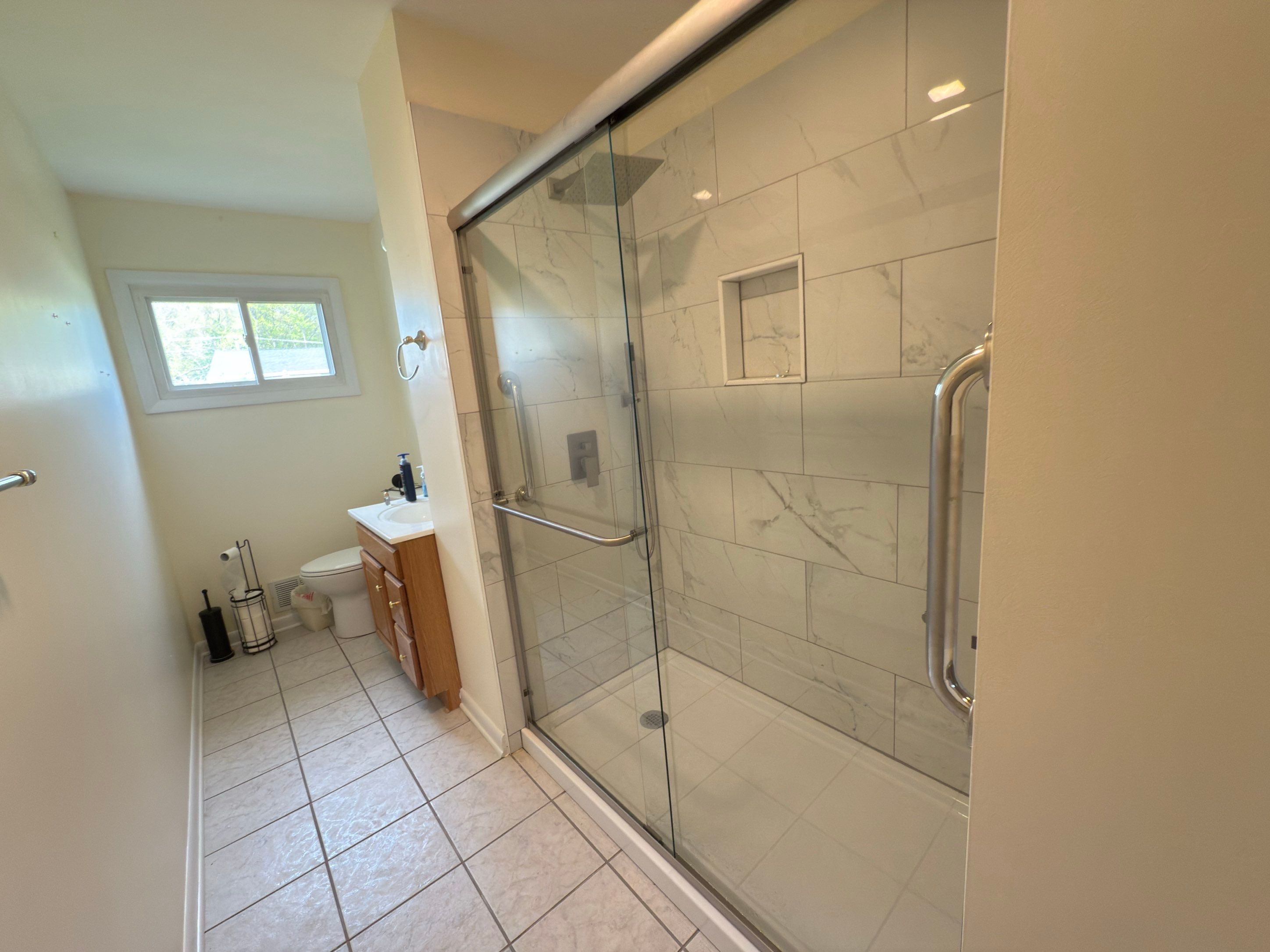 Bathroom Remodel using Tile by Home Concepts Construction