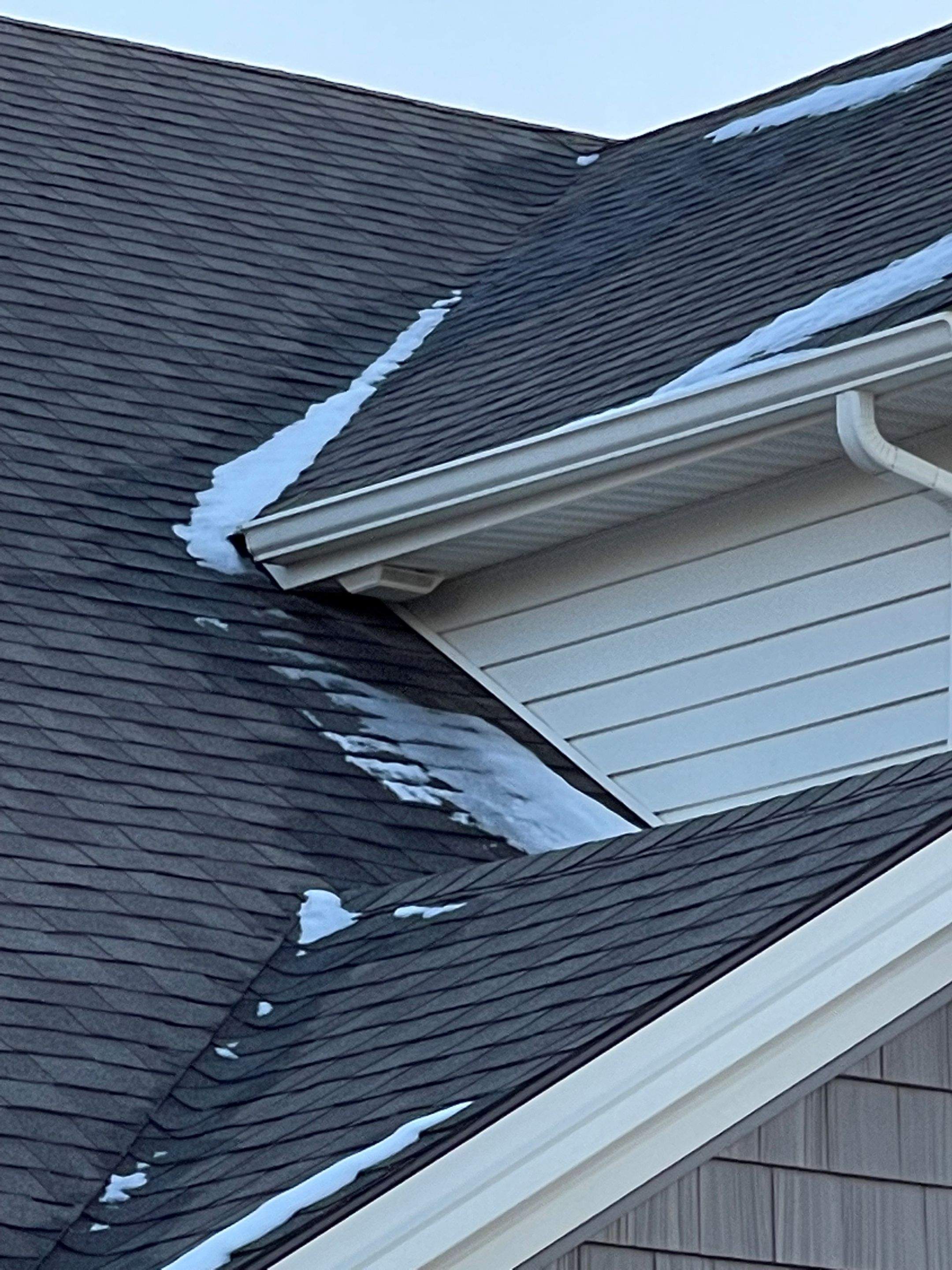 Icedamn Heat Cables and gutter guards by Absolute Roofing and Construction