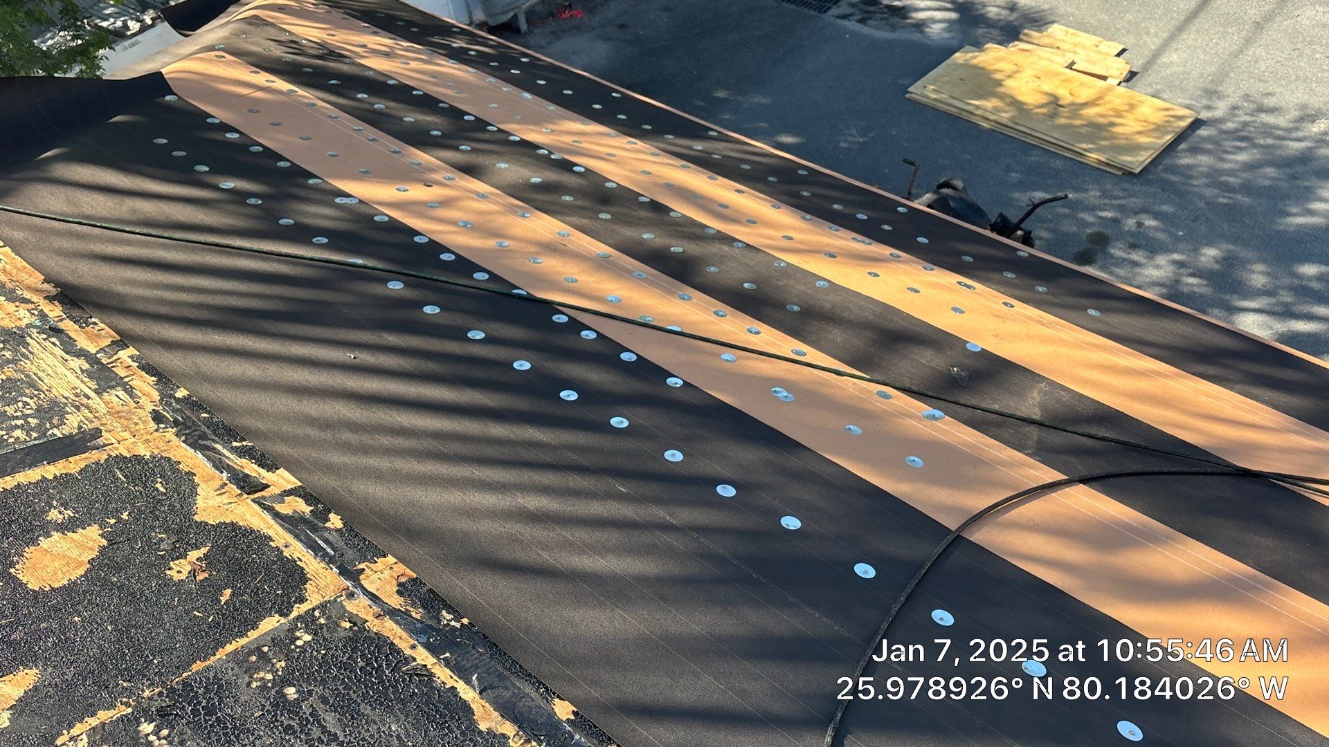 COMMERCIAL REROOF 24 GUAGE MEDIUM BRONZE 1-1/2" MECHANICAL SEAM "ZEBRA METHOD" by Earl W. Johnston Roofing 