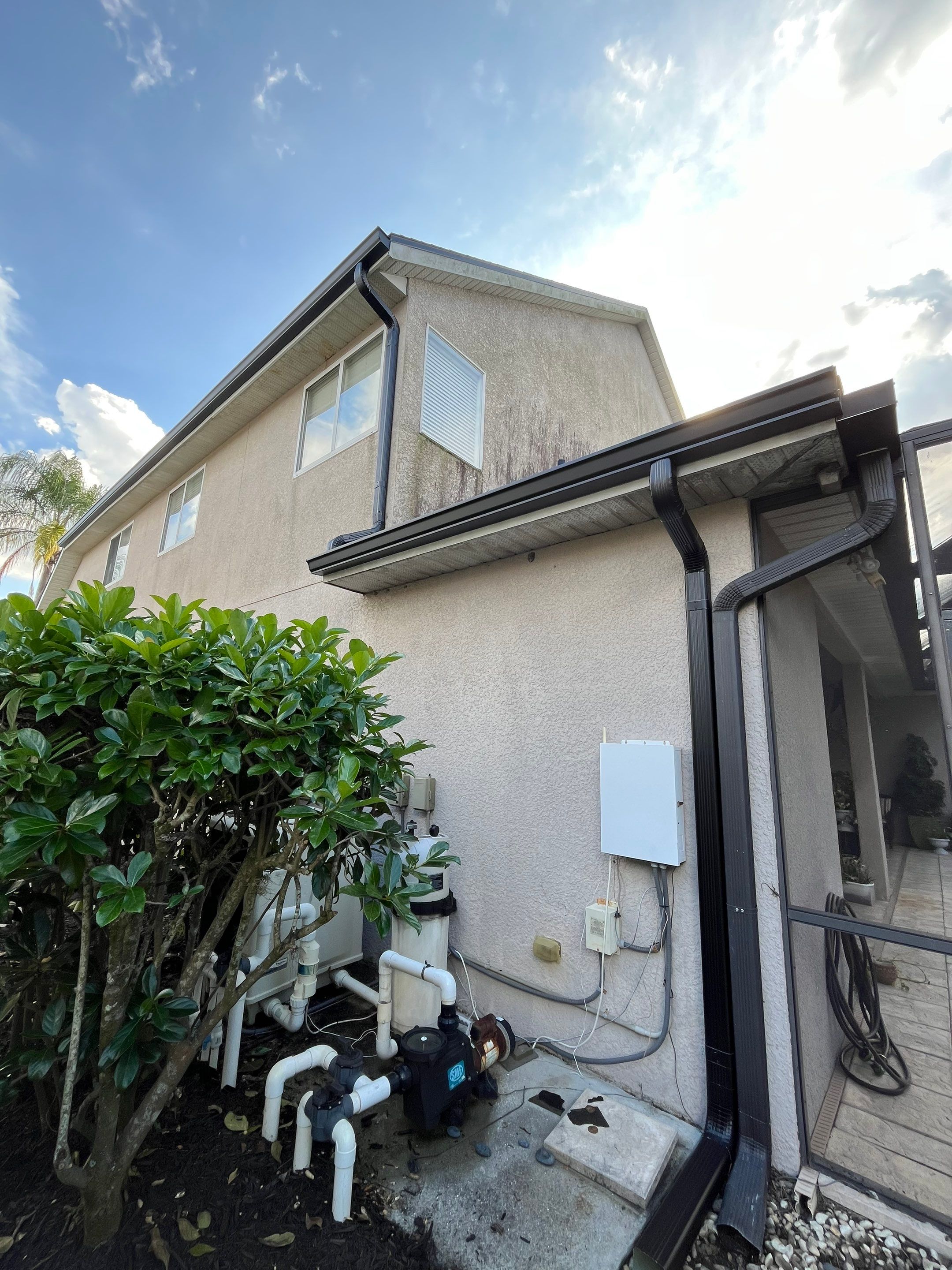 Black 6-inch Seamless Gutters for Modern Ellenton Homes FL by Gutter Professors