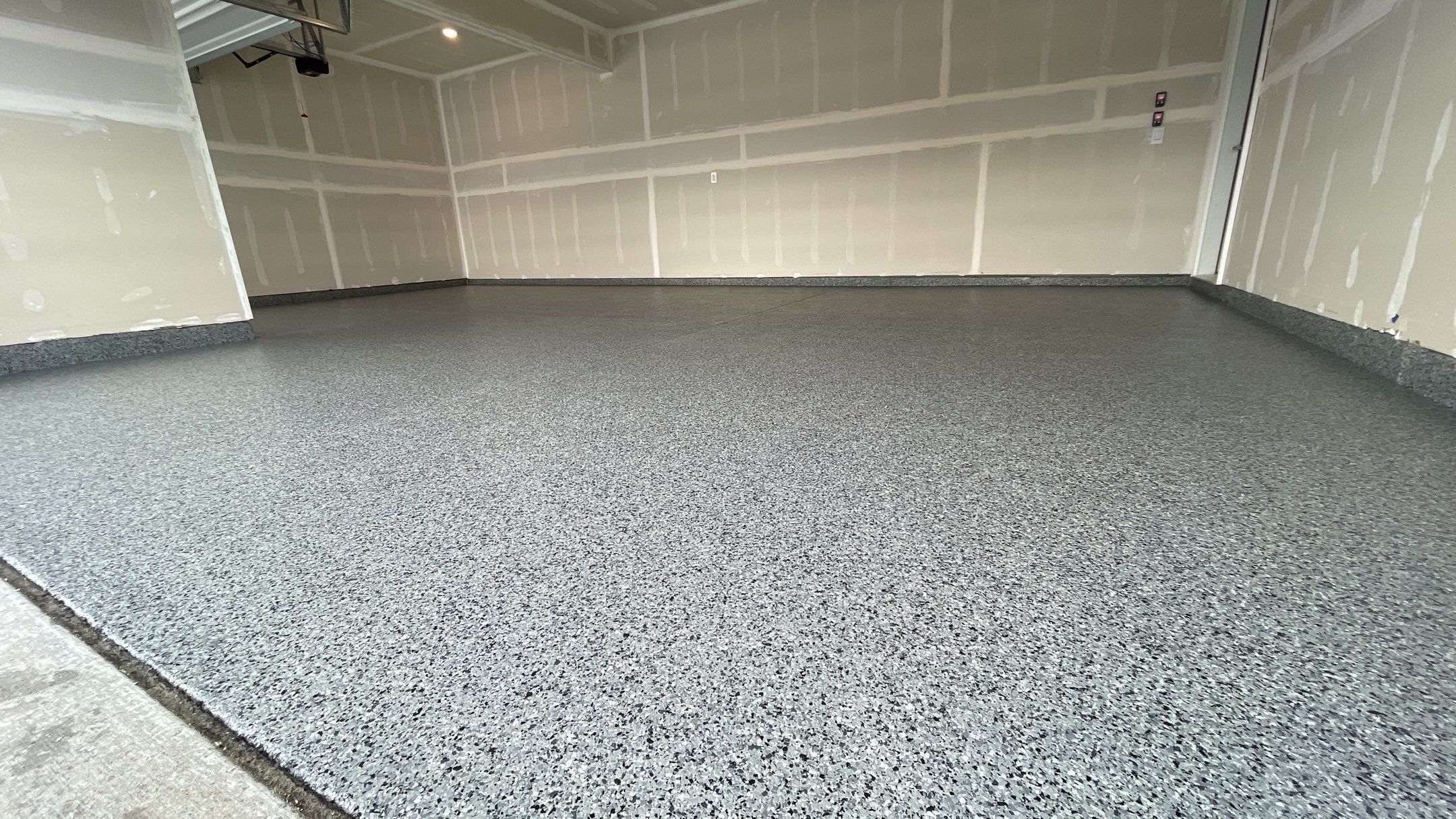 Garage Transformation using Nightfall by Croc Coatings, LLC