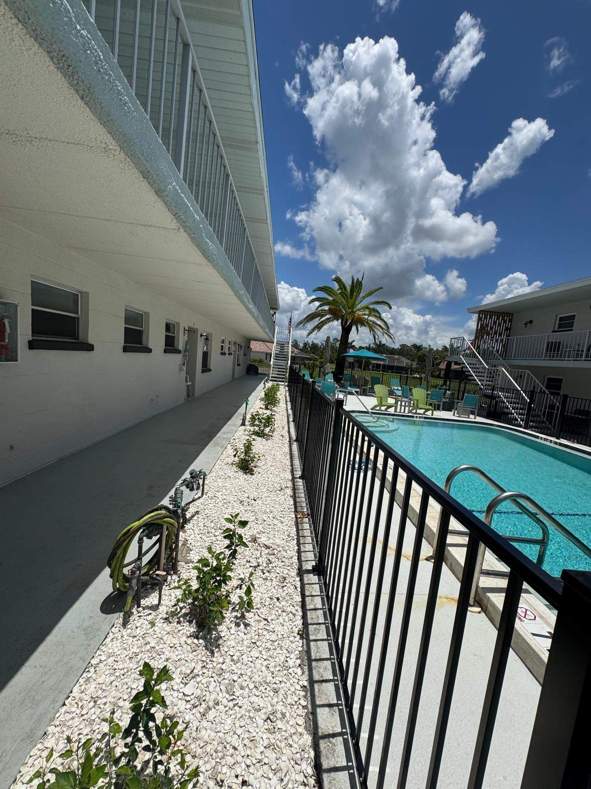 Black Aluminum Pool Fence Replacement in Englewood by True Fence LLC