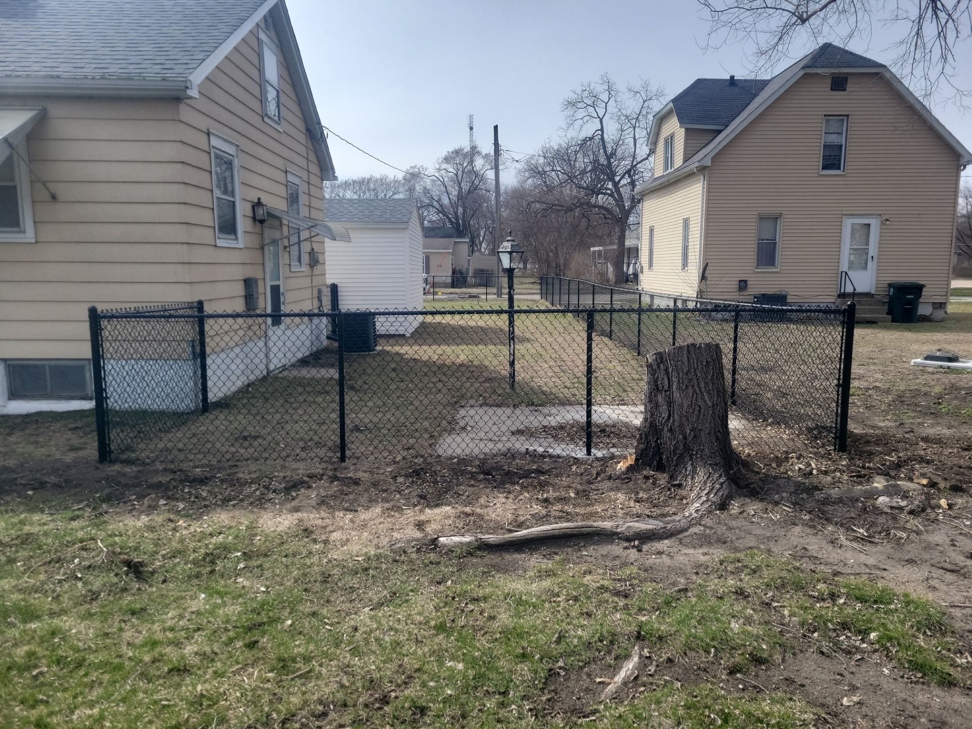 Black Chain Link Fence and Gate Installation in Waterloo by Perfect Picket Fence and Stain