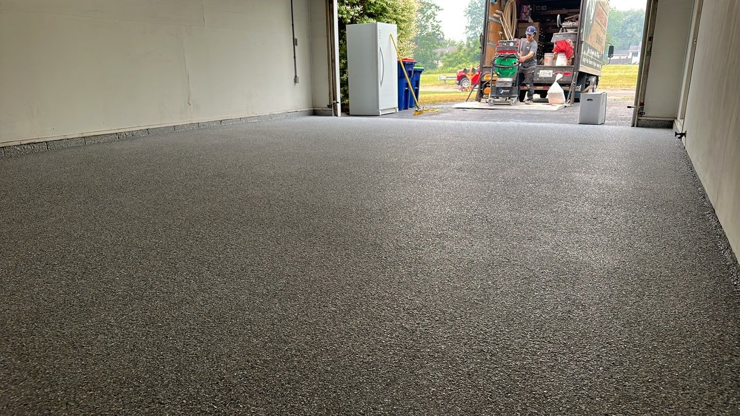 Silverado garage floor coating  by NG Masonry & Construction LLC
