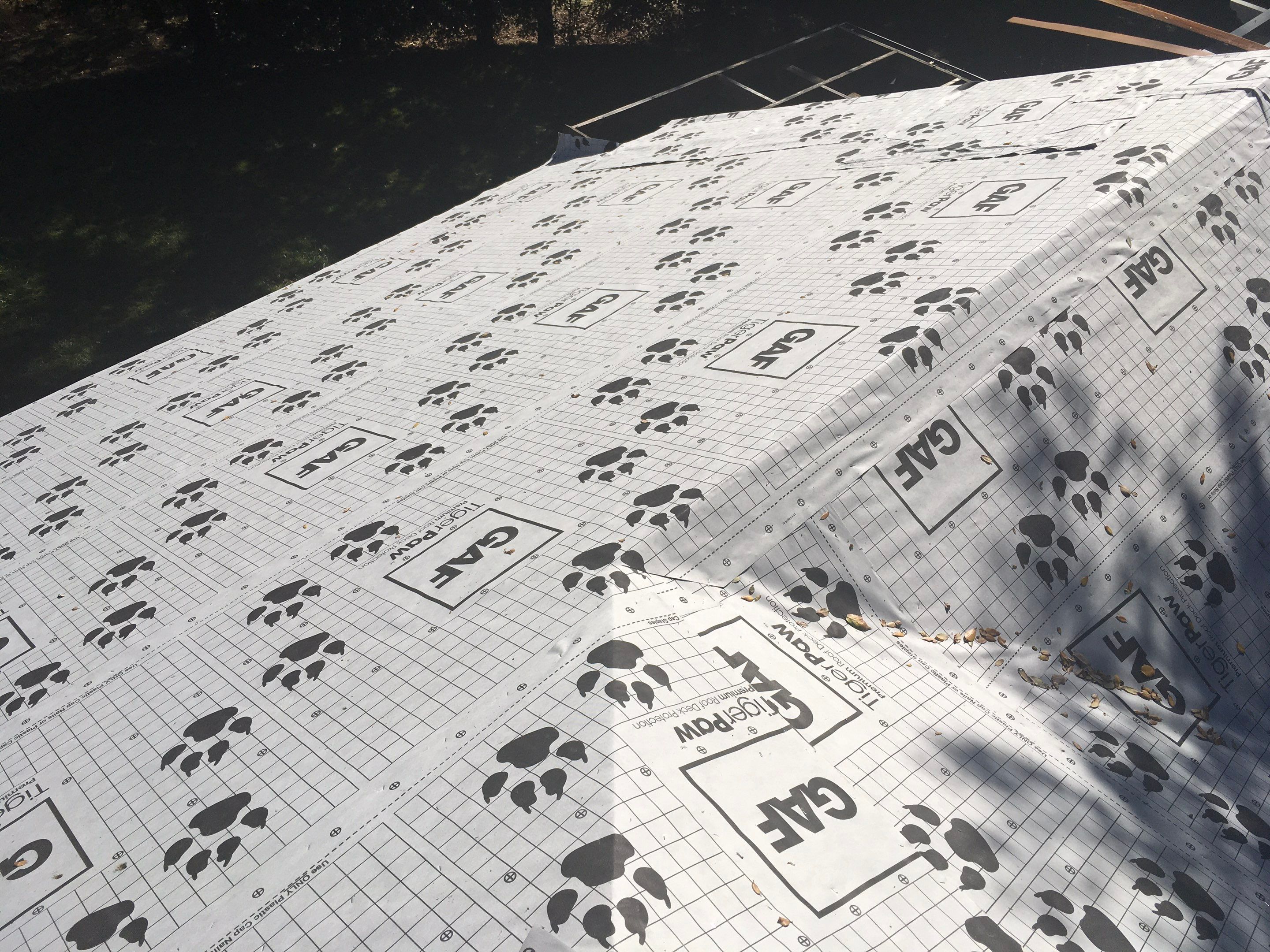 Metal roofing installation using Standing seam metal roofing system by Straight Edge Roofing Inc