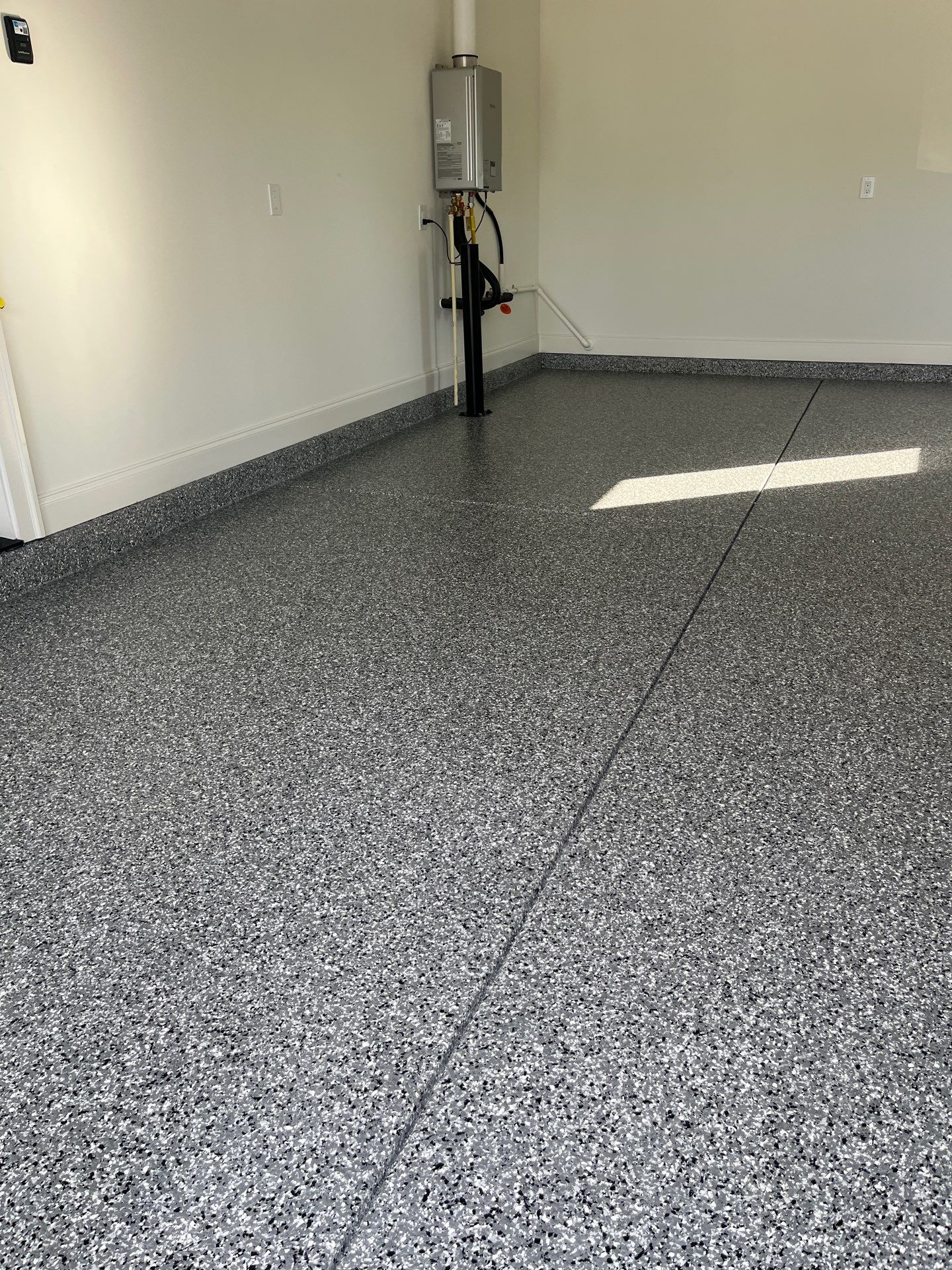 Garage Floor Coating using Wombat by My Garage Floor Guys