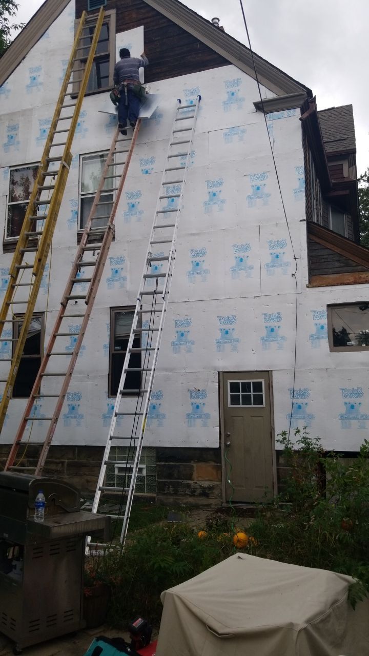James Hardie Siding on Antique Home by Absolute Roofing and Construction