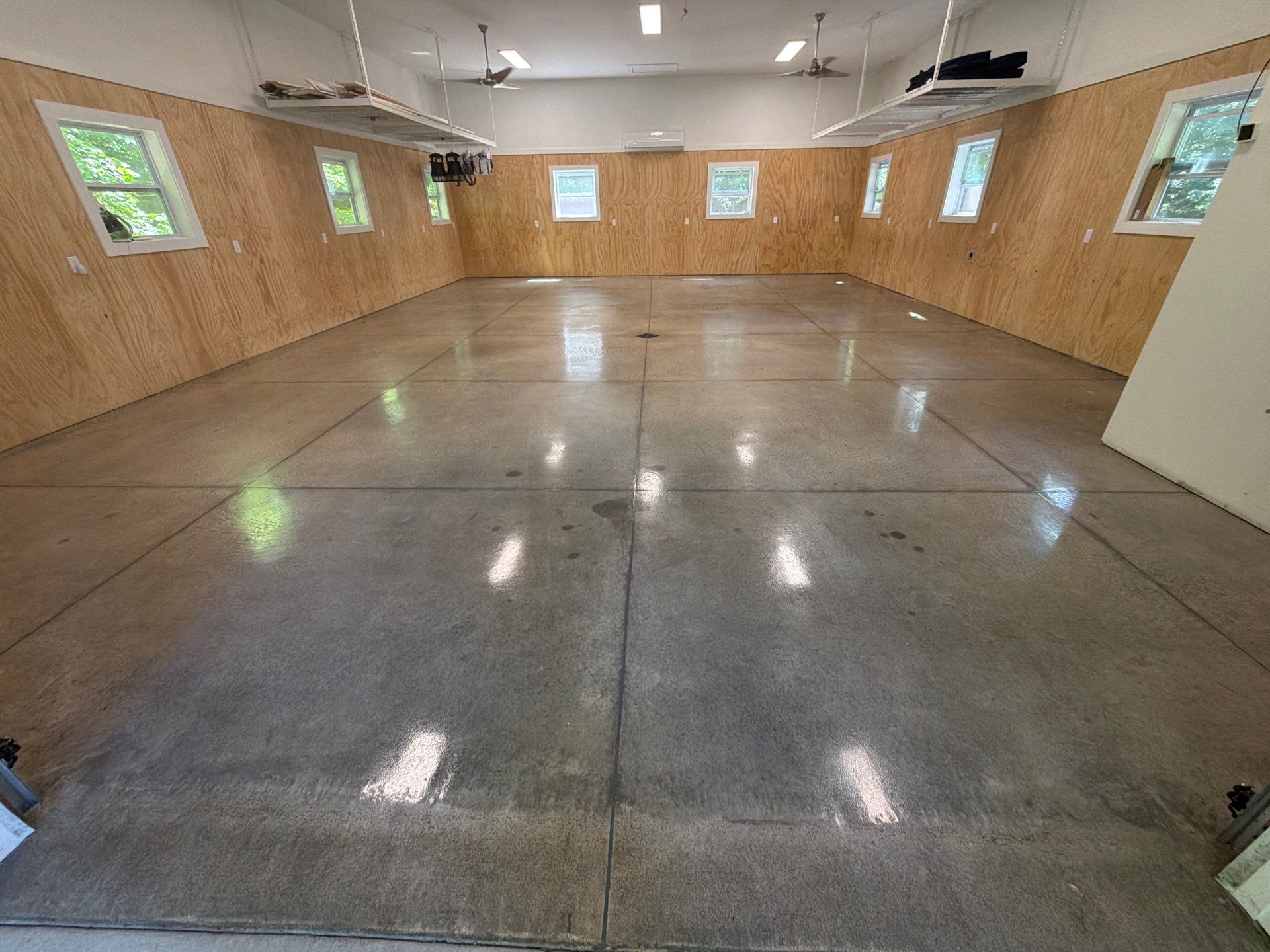 Garage Epoxy Floor Installation and Concrete Surface Polishing in Shelby by Gordon Painting