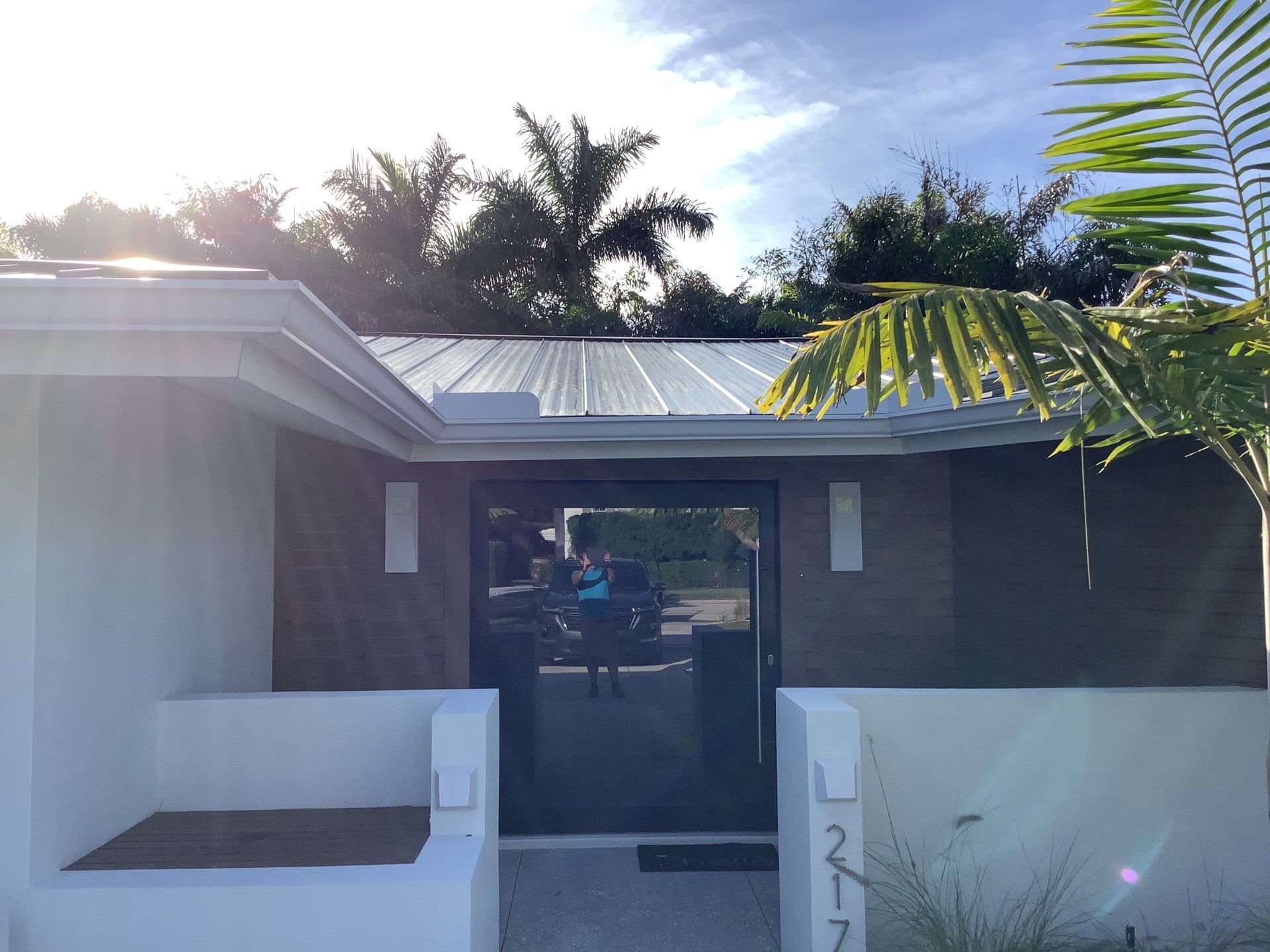 White Seamless Gutters and Downspouts in Sarasota FL by Gutter Professors
