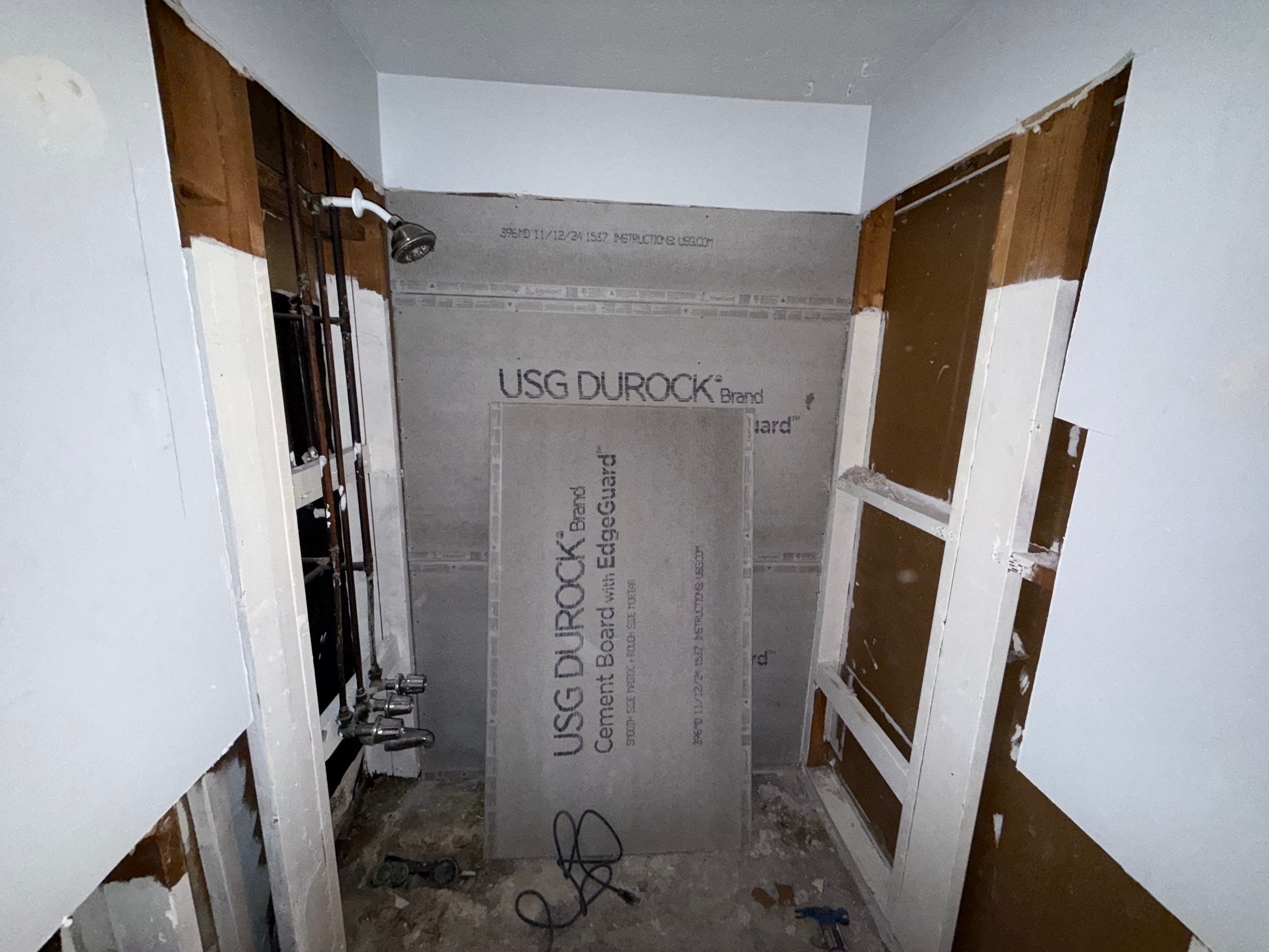 Dual Bathroom Makeover by urban green energy llc