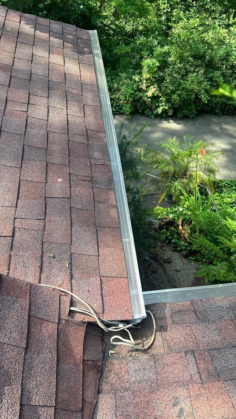 Very overdue gutter cleaning and screening by Above All Gutters 