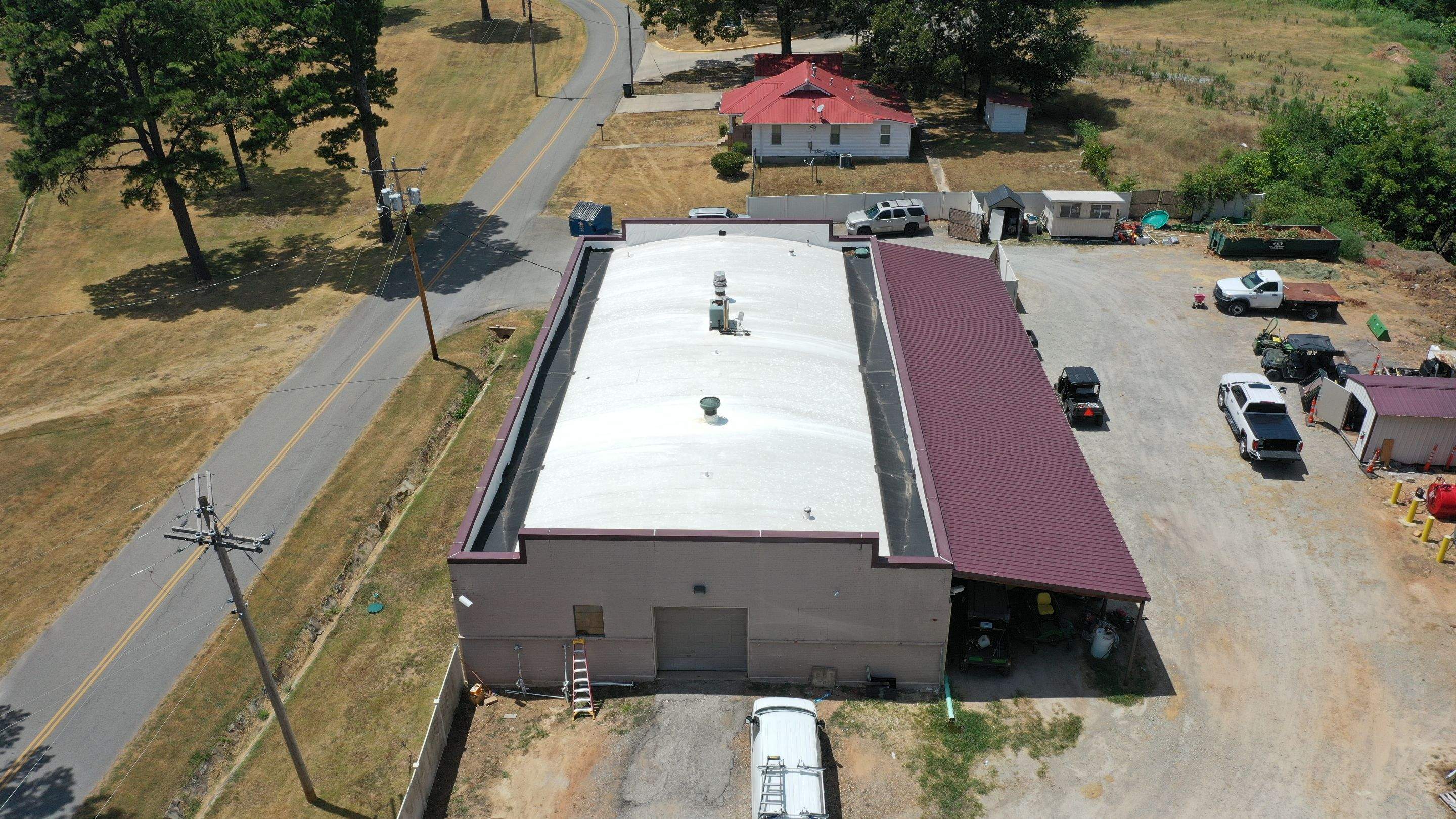 Choctaw Nation Healthcare Center - White Building by Hostetler Roofing