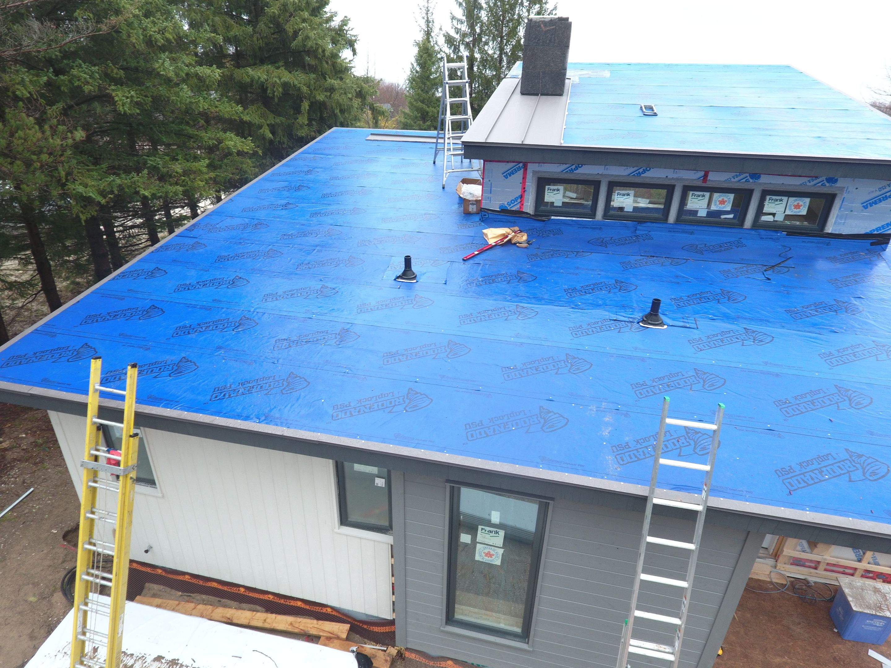 Residential Roofing Installation using 24 Ga Standing Seam Metal by Jay Carter Roofing & Sheet Metal