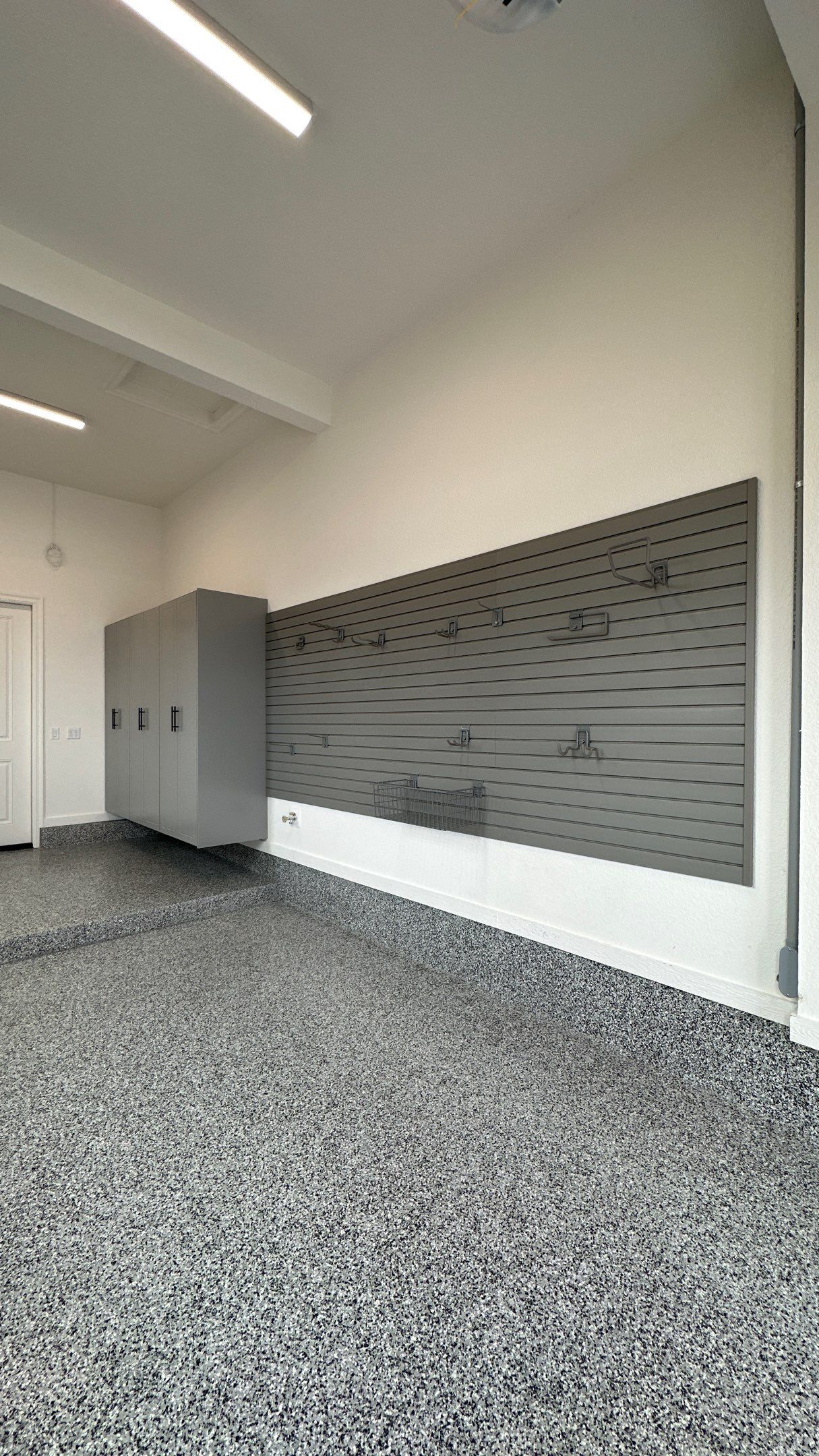Mike & Pam transformed their garage with a Banner Garage Floor and Cabinets by Banner Garage