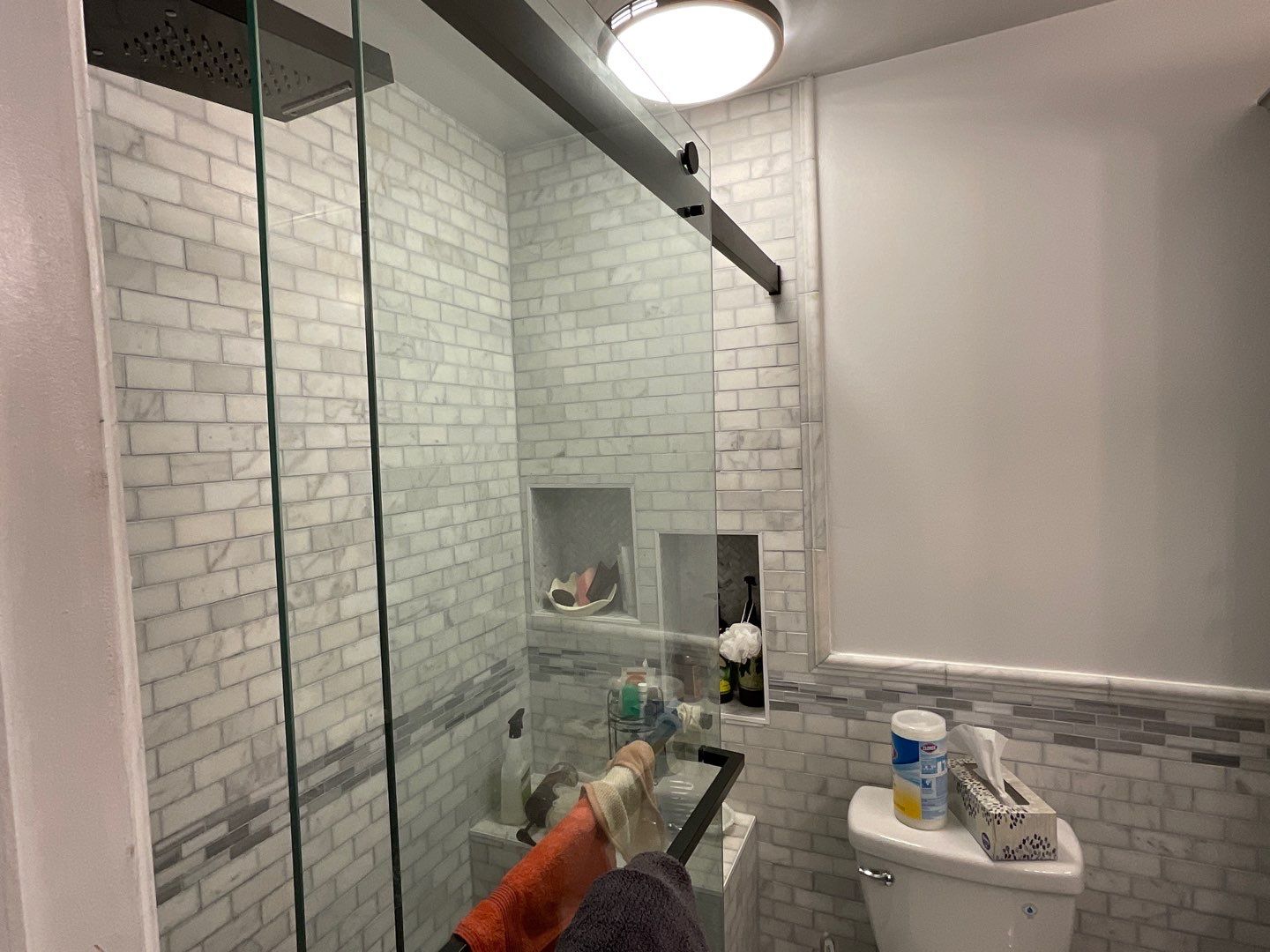 Bathroom Remodel using Two new bathroom design and new floors by Alpha Design Services