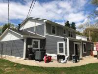 Siding Installation using JH Batten Smooth and JH Select Cedarmill Eased Edge by ExteriorPros