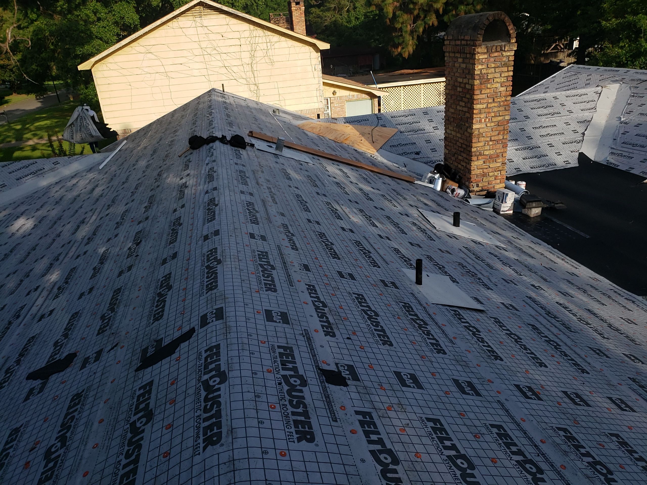 Residential Roofing Installation using Roof Replacement by American Roofing & Construction LLC