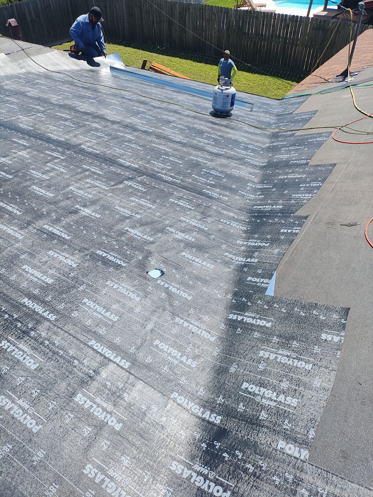 Cover that Patio! by Bayfront Roofing and Construction