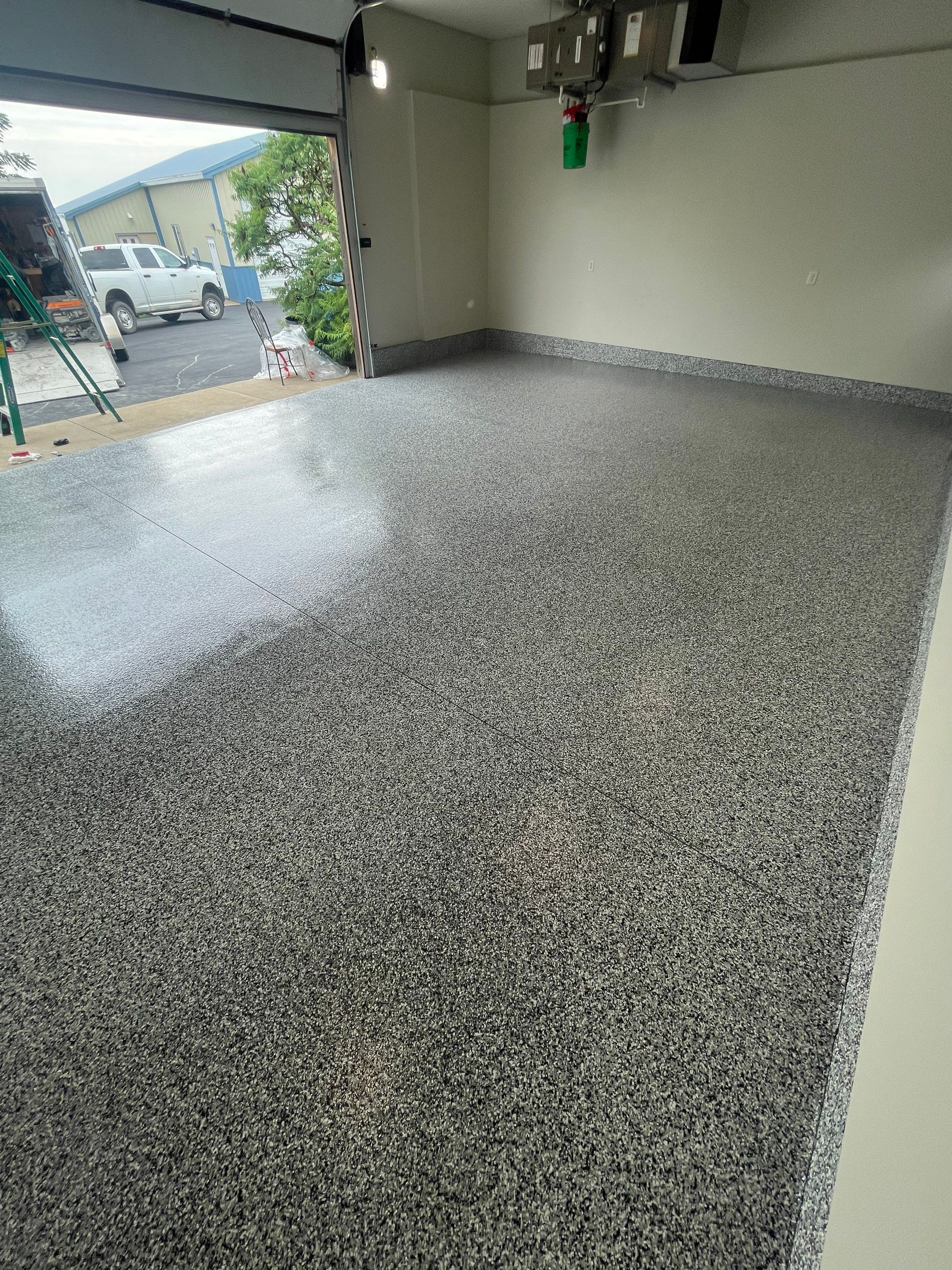 Domino Flake Floor Coating and Crack Repair in Chancellor by Select Painting, Coatings & Garage Cabinets