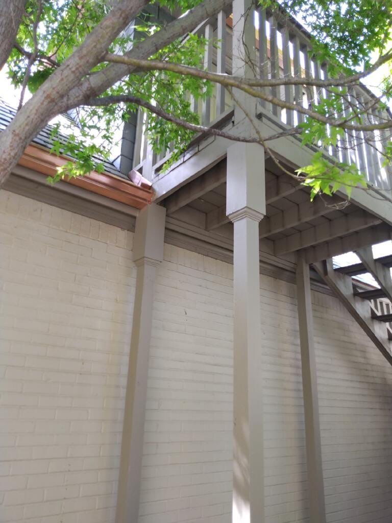 Gutter Installation using Pure Copper Seamless Rain Gutter System by Harvey Roofing & Construction