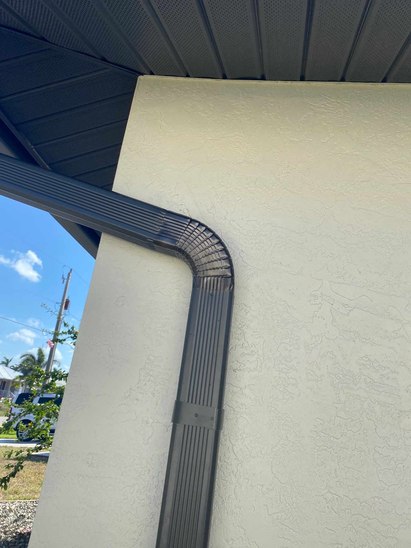 Black Seamless Gutters for Modern Homes in Punta Gorda by Gutter Professors