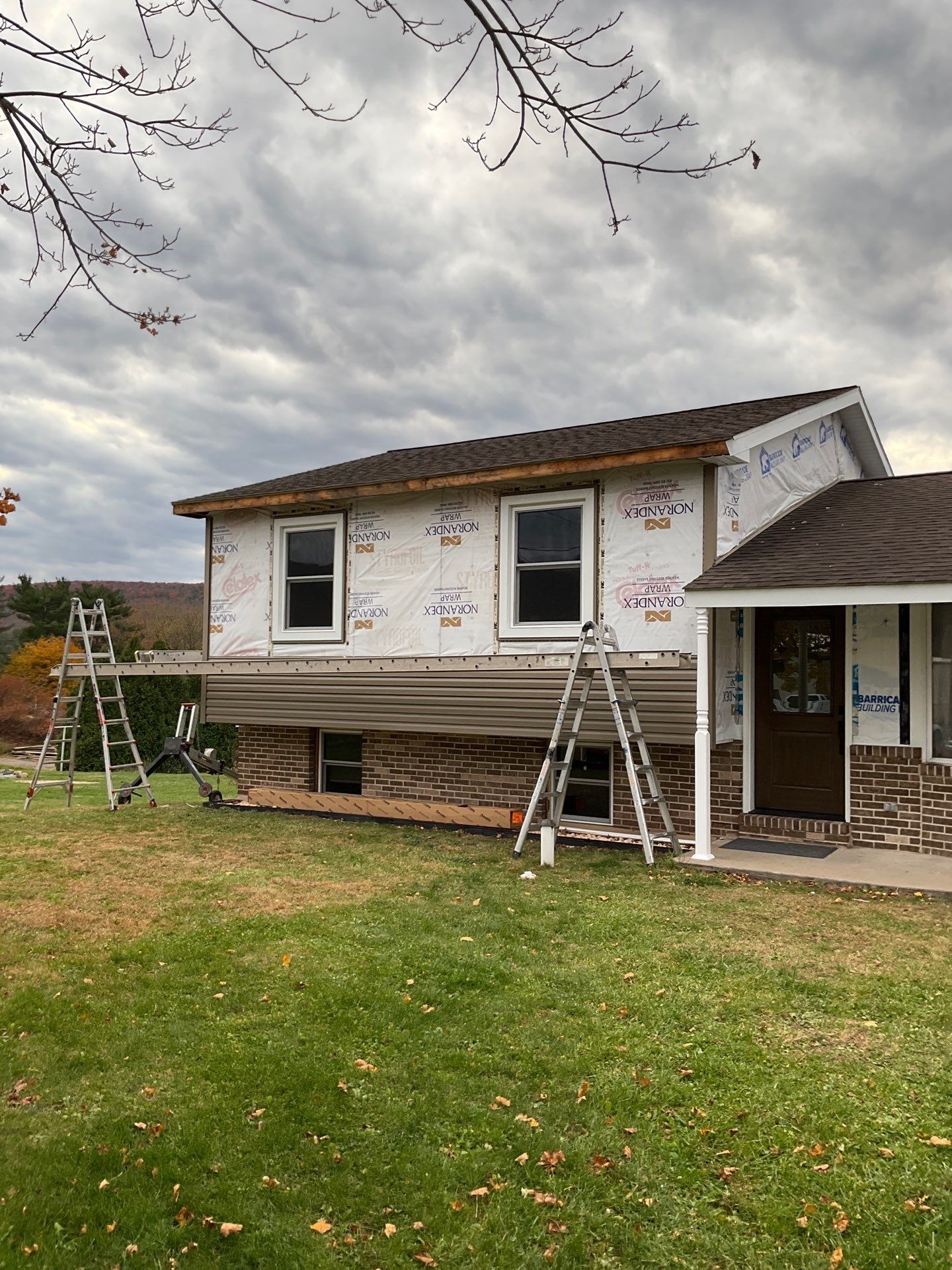 Exterior Siding Replacement With Window & Door Upgrades by Esh Builders