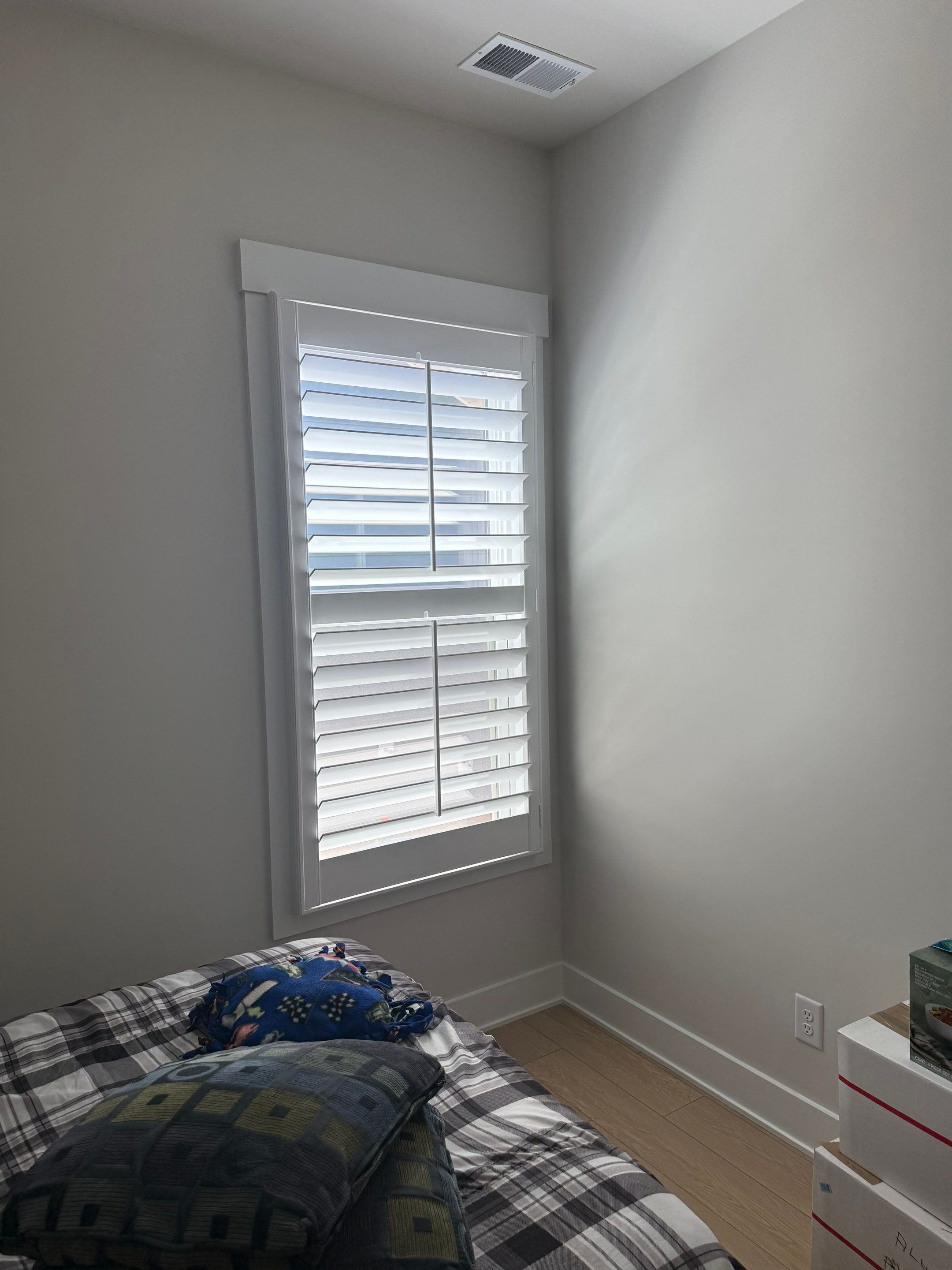 Whole Home Interior Shutter and Roller Shade Installation in Charlotte by Southern Traditions Window Fashions