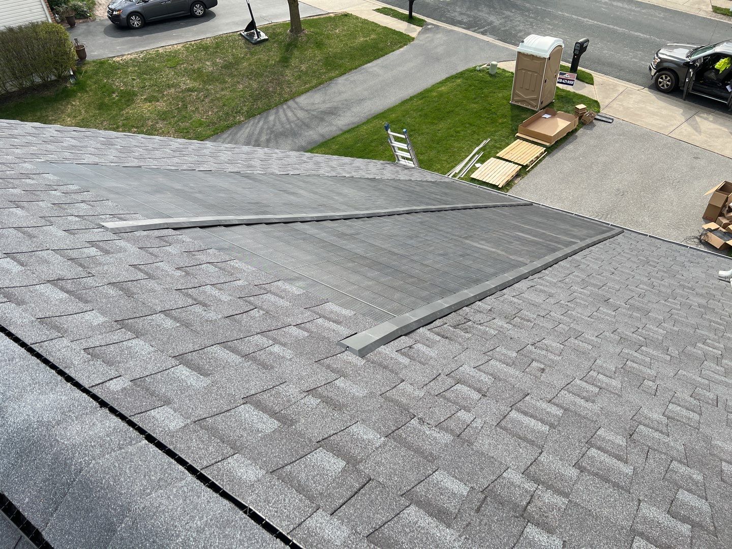 Solar Roof Replacement using GAF Timberline Solar Shingles by American Home Contractors