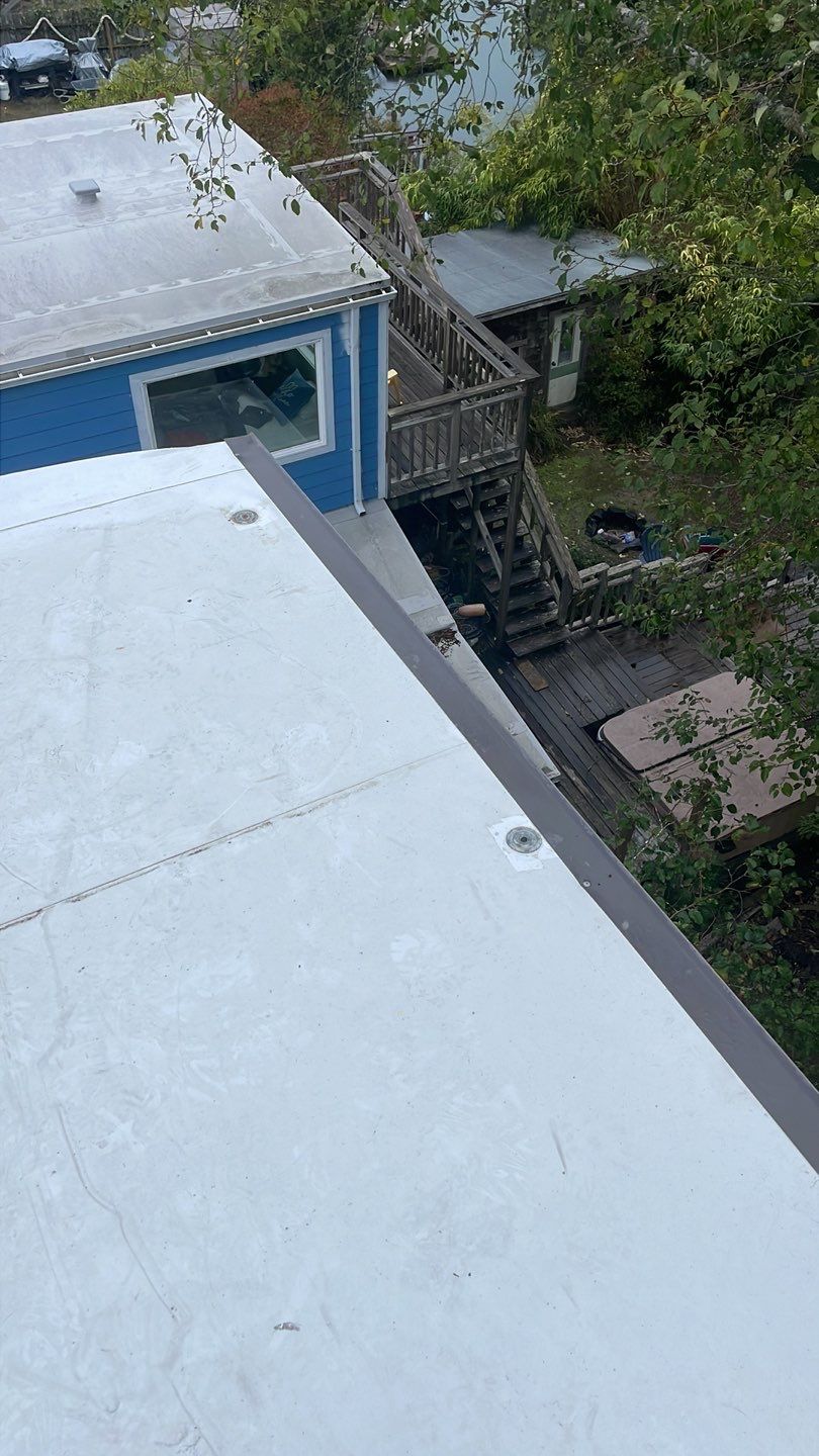 Commercial Roofing Installation using GAF 60Mil TPO  by Orezona Building & Roofing Company, Inc.