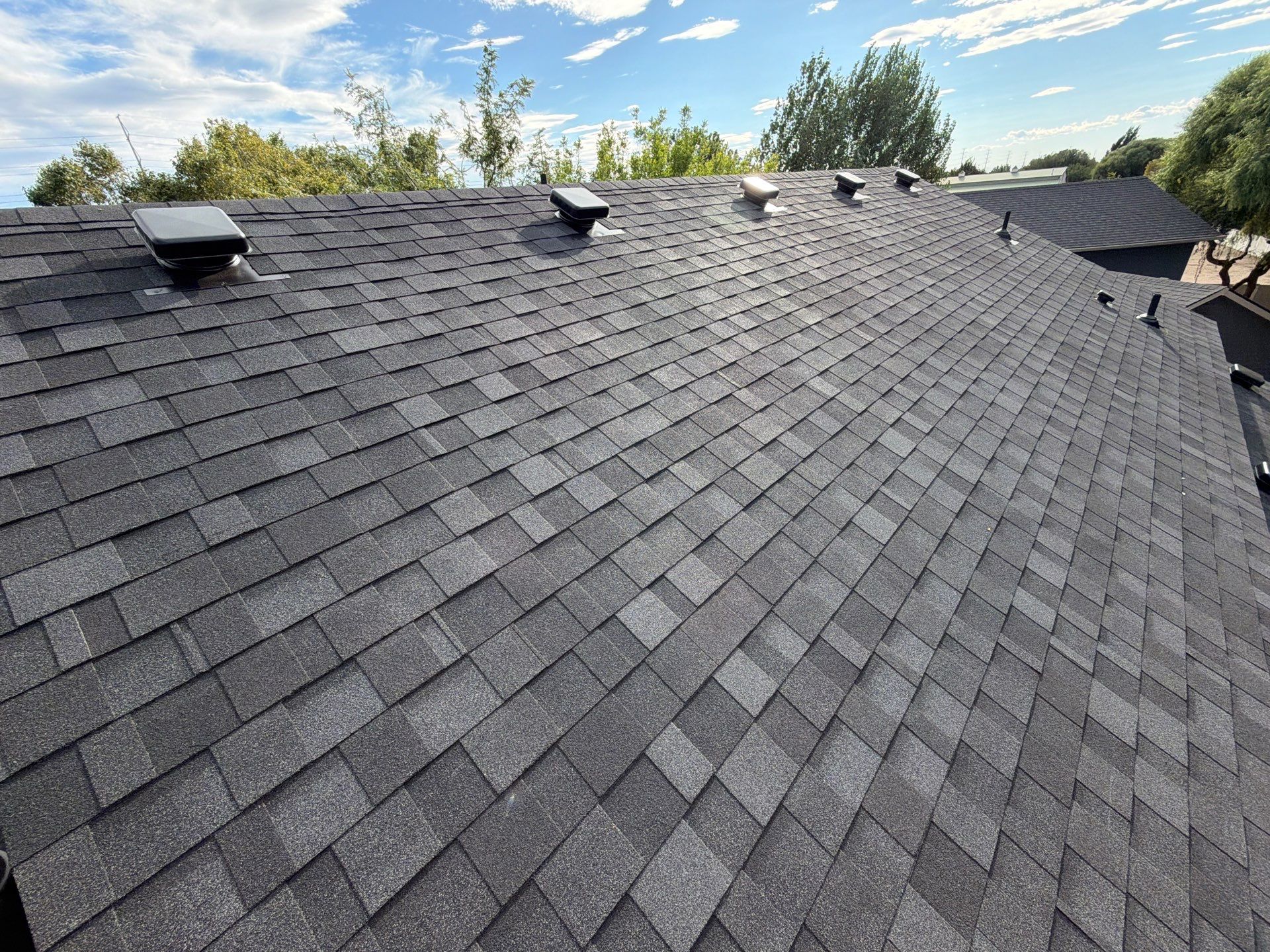 Residential Roof Replacement in Meridian Featuring Charcoal Architectural Shingles by Olive Roofing