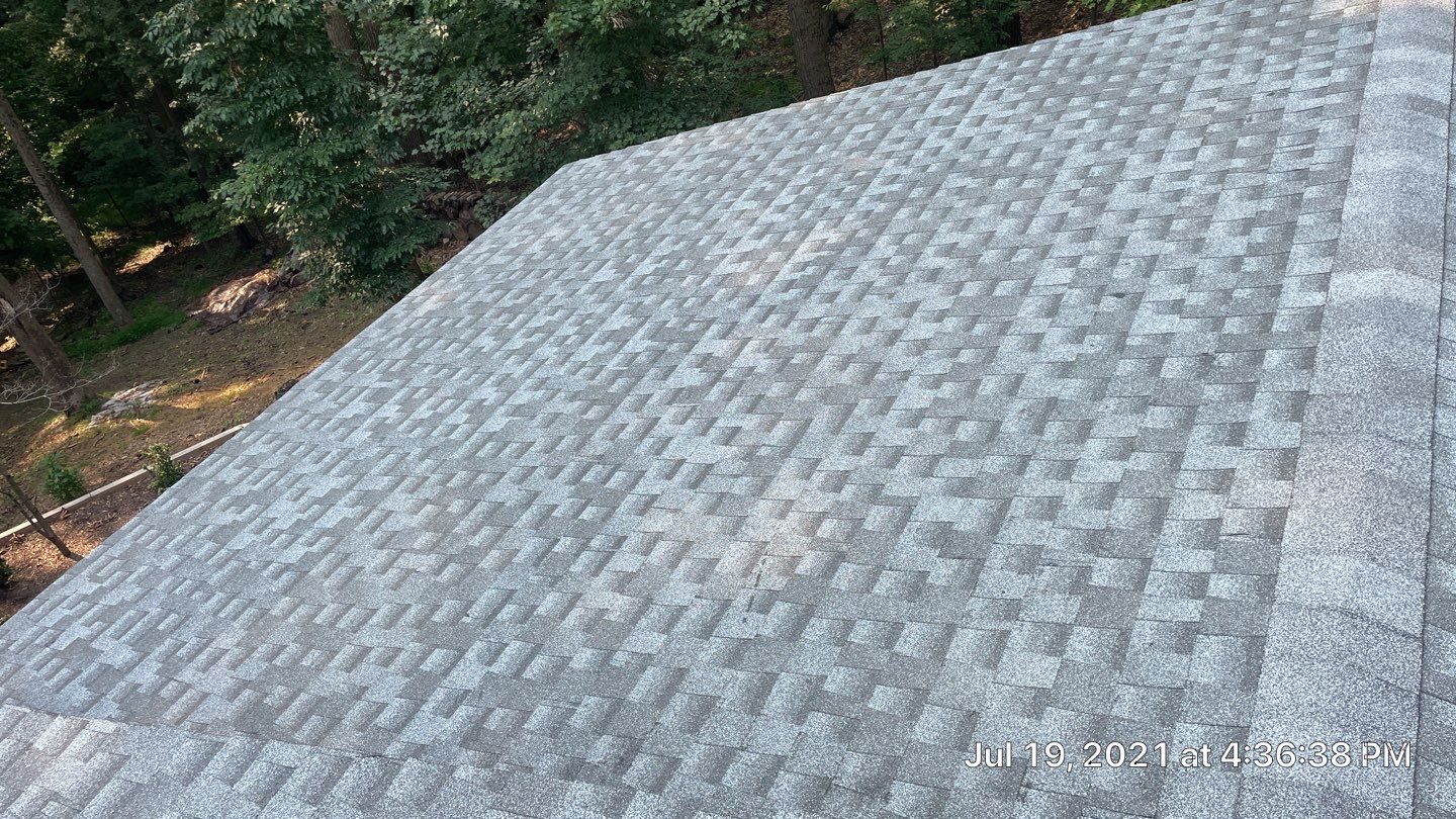 Deckhouse Roof Replacement by American Home Contractors