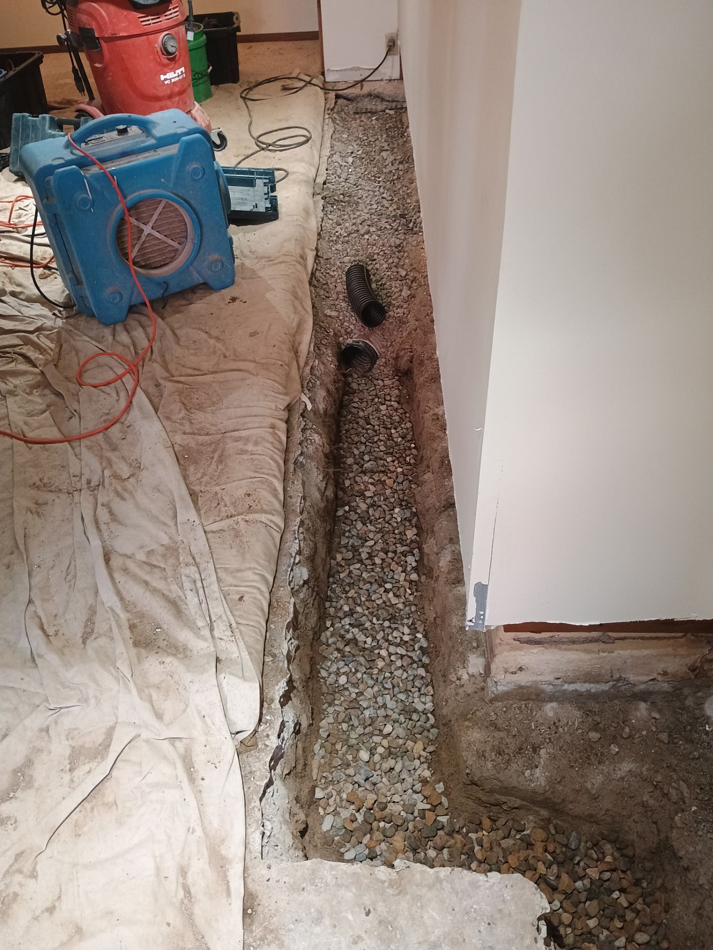 Completing the Connection for Lisa's Drain Tile System by Waterproofing Northeast