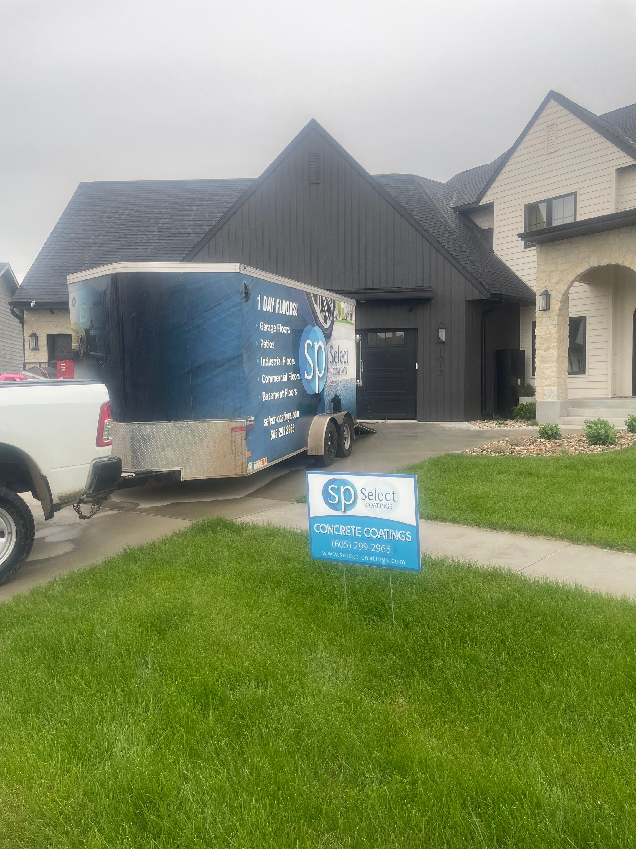 Custom Speckled Concrete Coating for Dell Rapids Garage by Select Painting, Coatings & Garage Cabinets