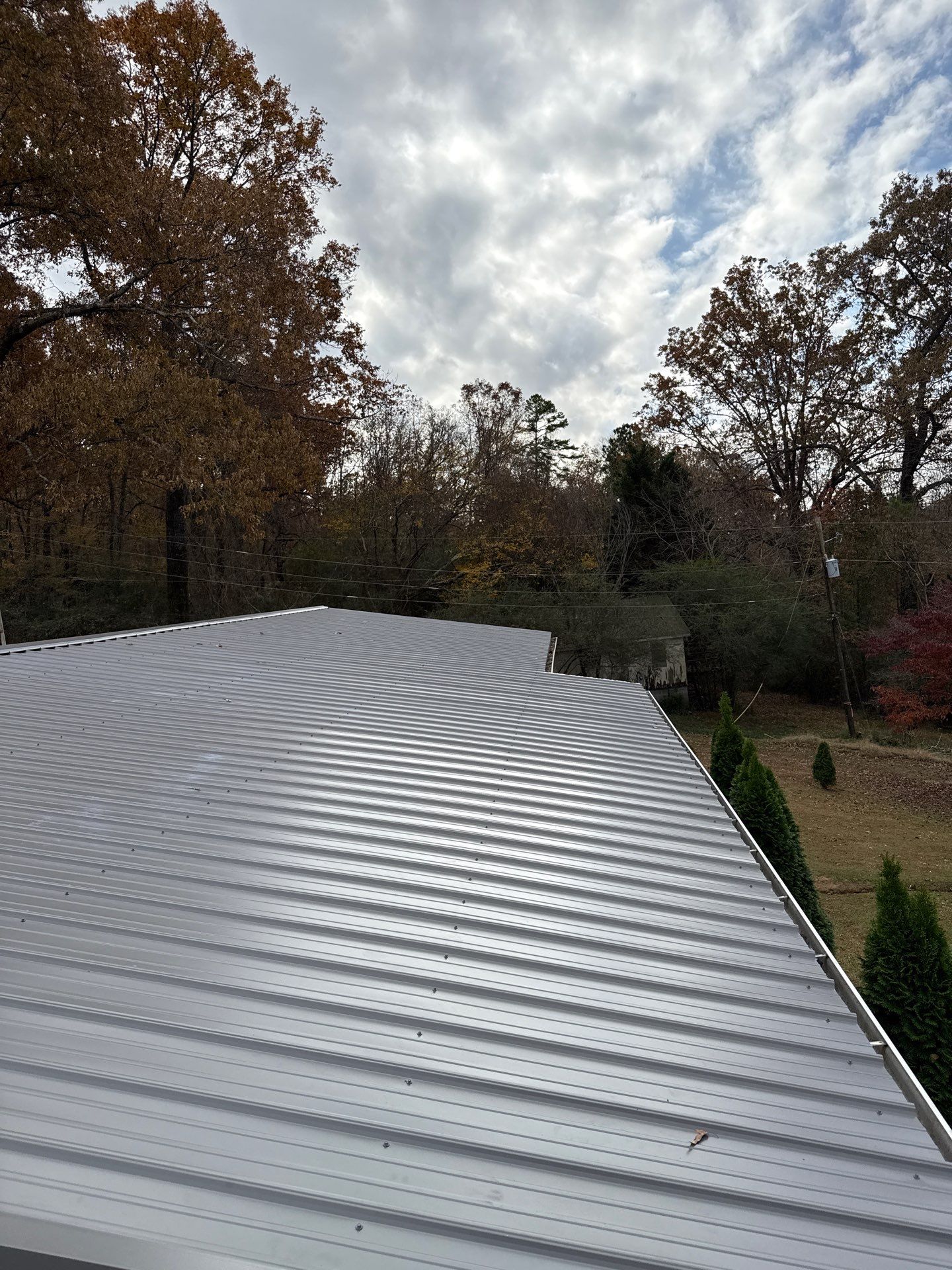 Roof Replacement in Pinson (Metal Roof) by The Roofing Dudes