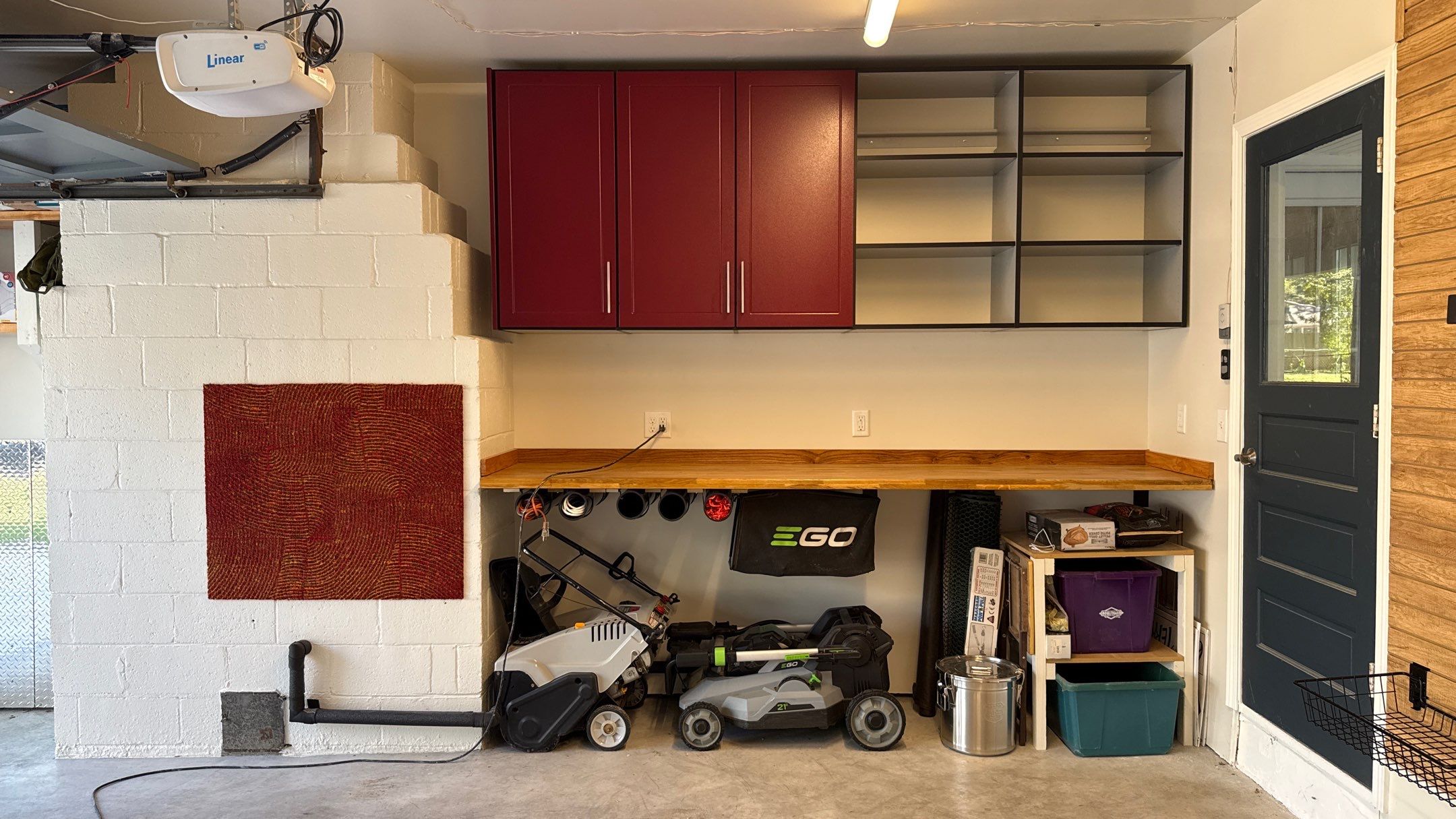 Custom Garage Storage and Slatwall Installation in Prairie Village by Banner Garage