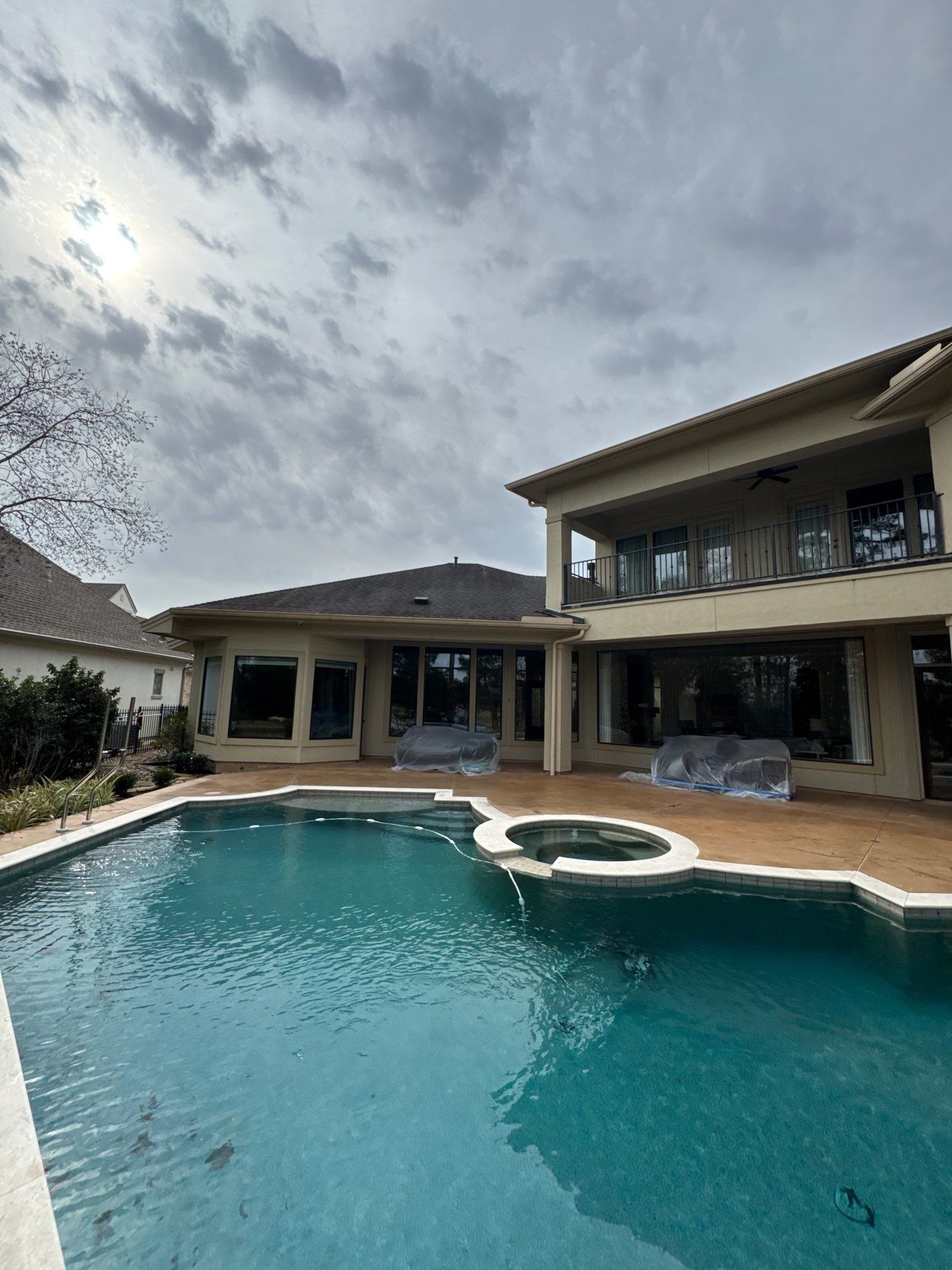 Complete Exterior Painting and Stucco Refinishing in Spring by Rolling Nations
