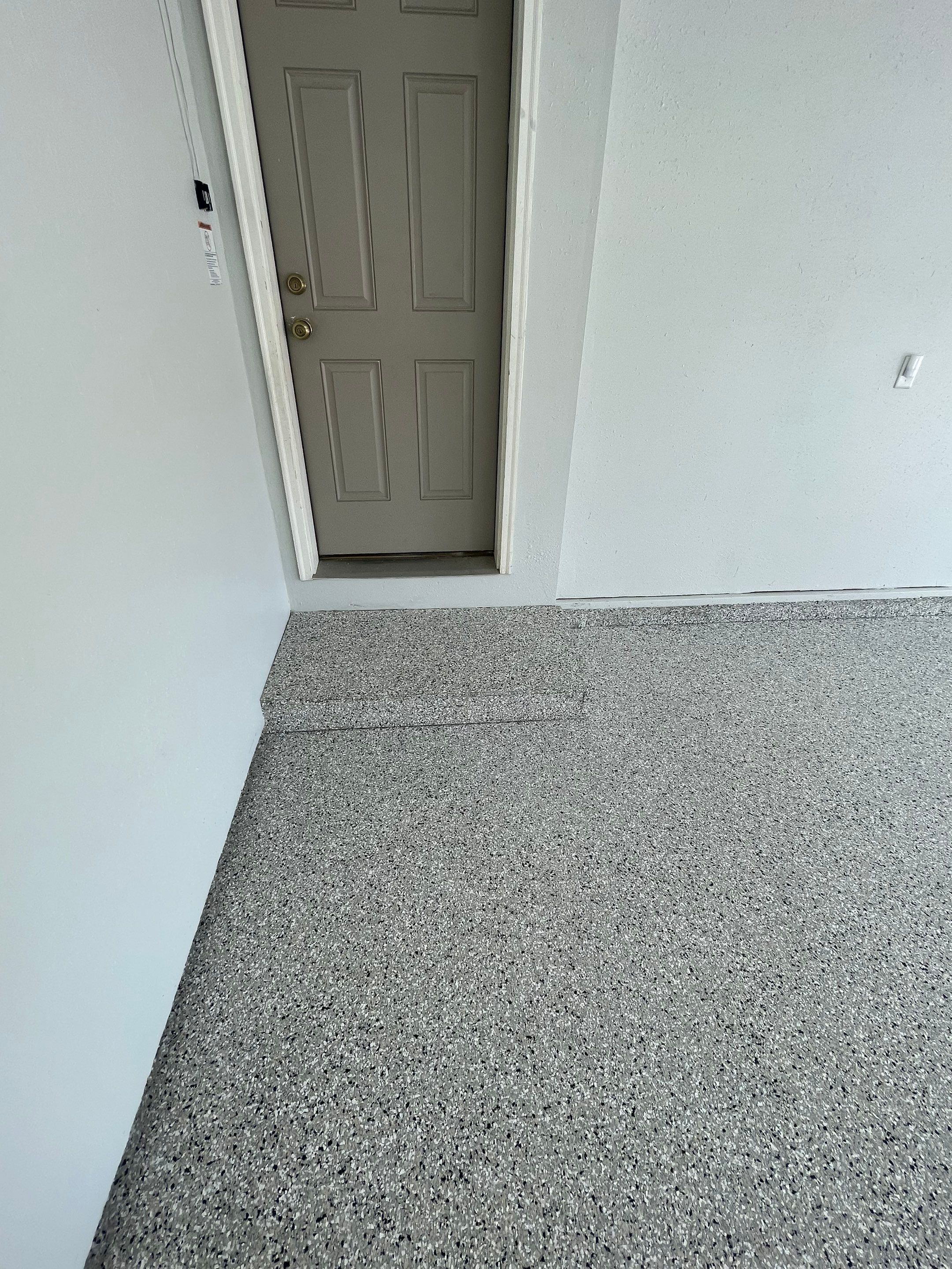 Multi-Car Garage Floor Coating and Crack Repair in Tea by Select Painting, Coatings & Garage Cabinets