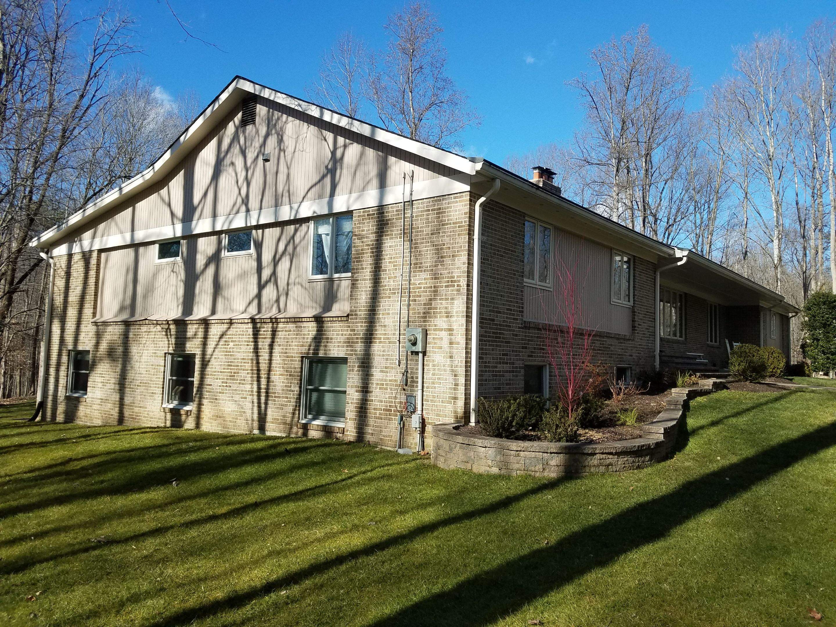 Roof, Siding, Door, and gutter replacement by American Home Contractors