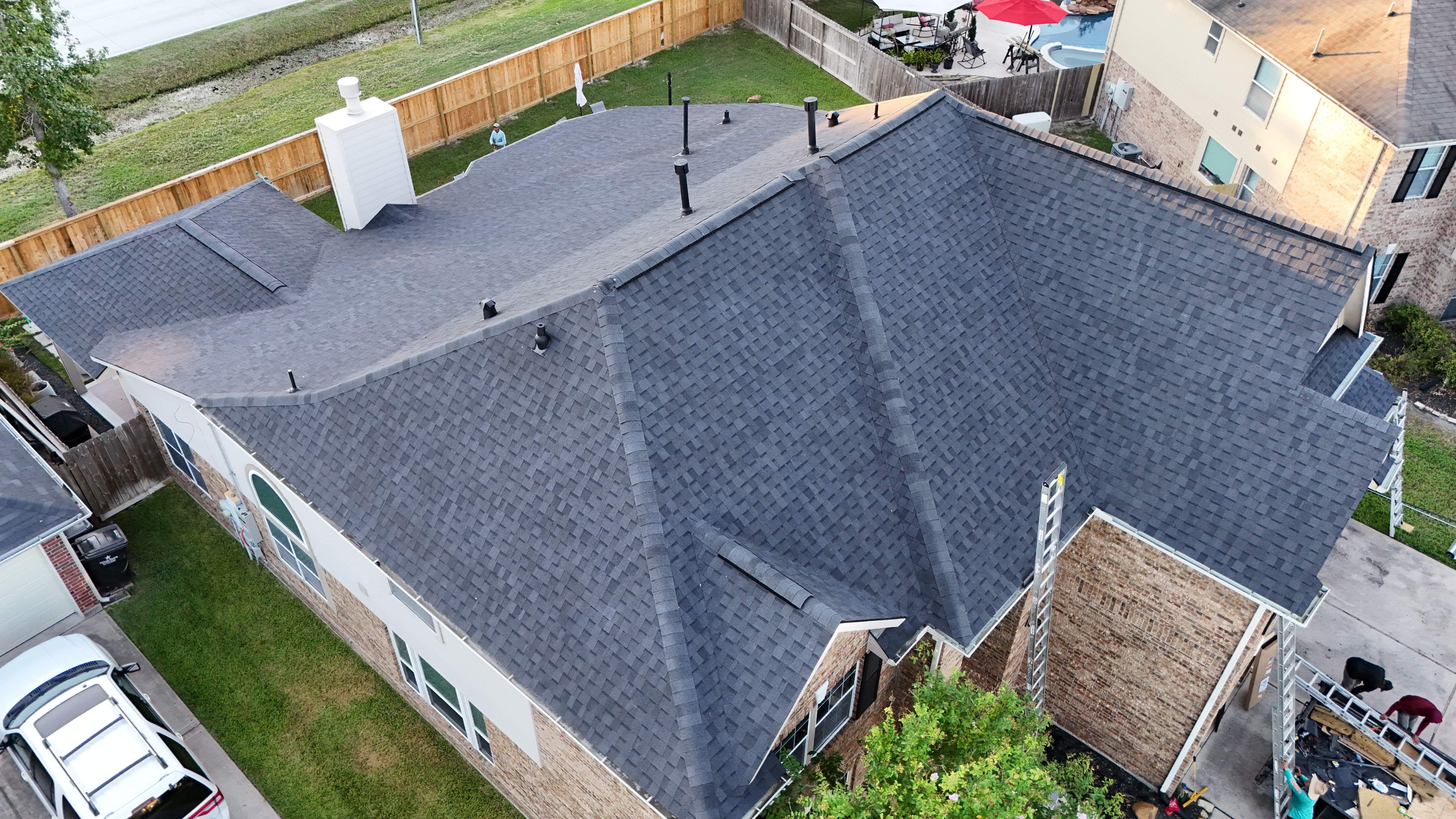 Poolside Home Roof Replacement — Spring, TX by PL Roofing & SB Roofing, LLC.