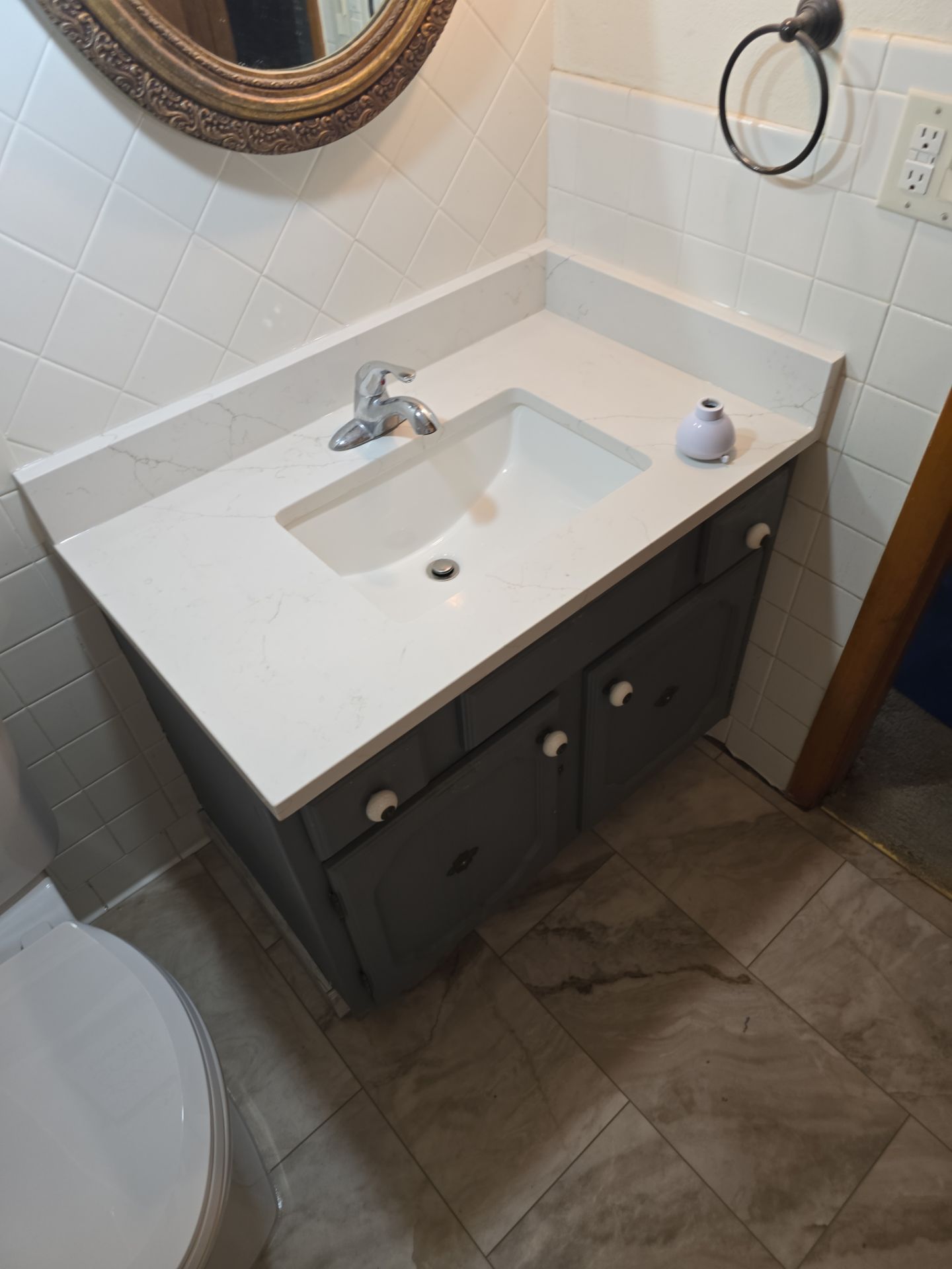 Tub to Shower , flooring, and countertop by The Shower Company