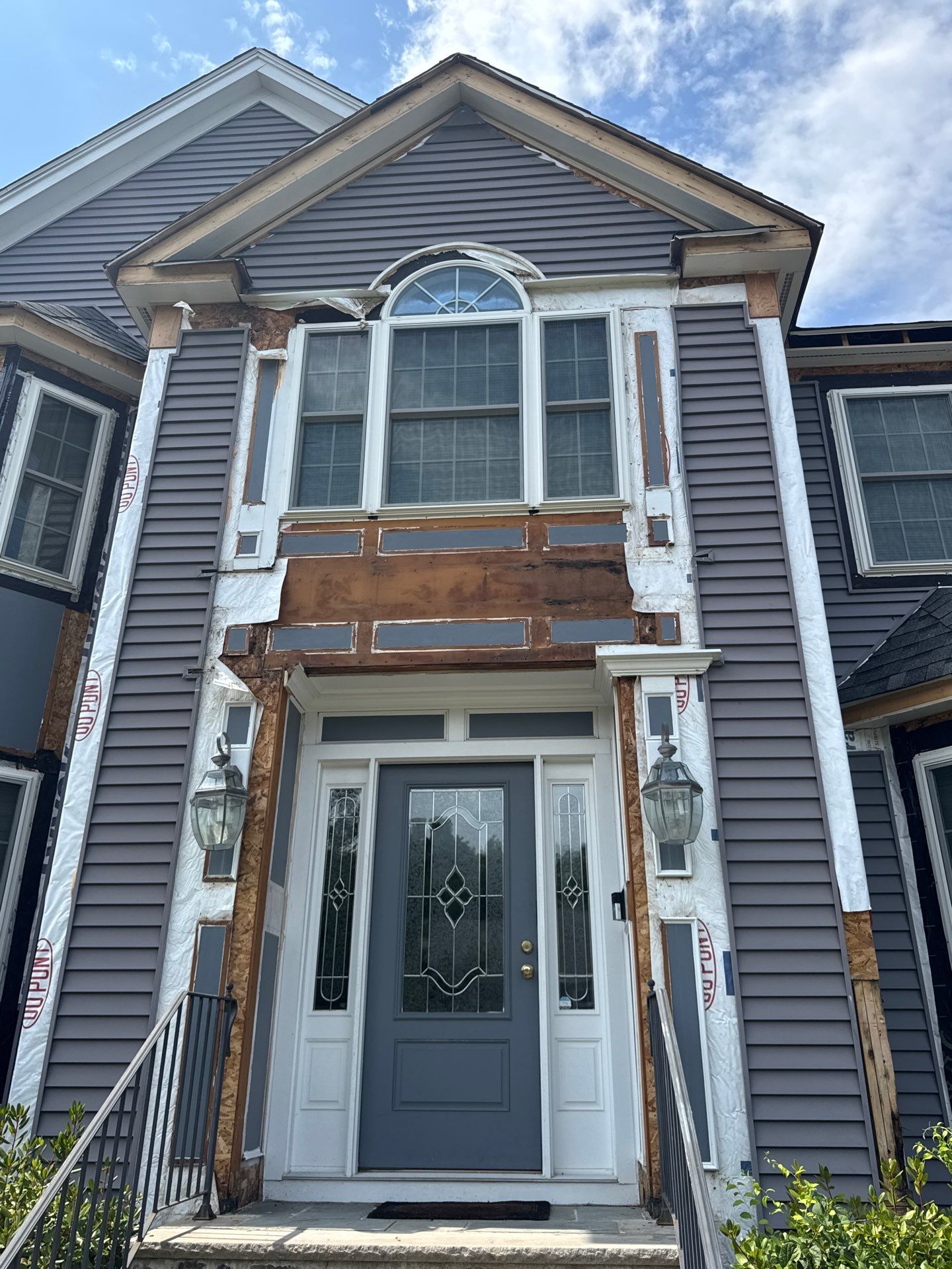 Roof, Trim, Deck, and Gutter Restoration by Mighty Dog Roofing of Greater Middlesex County