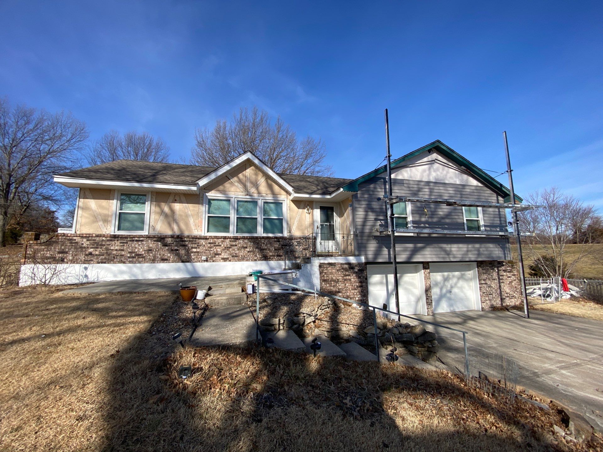 Siding Installation using Exterior Portfolio Vinyl Siding by EEC Windows, Siding & Roofing