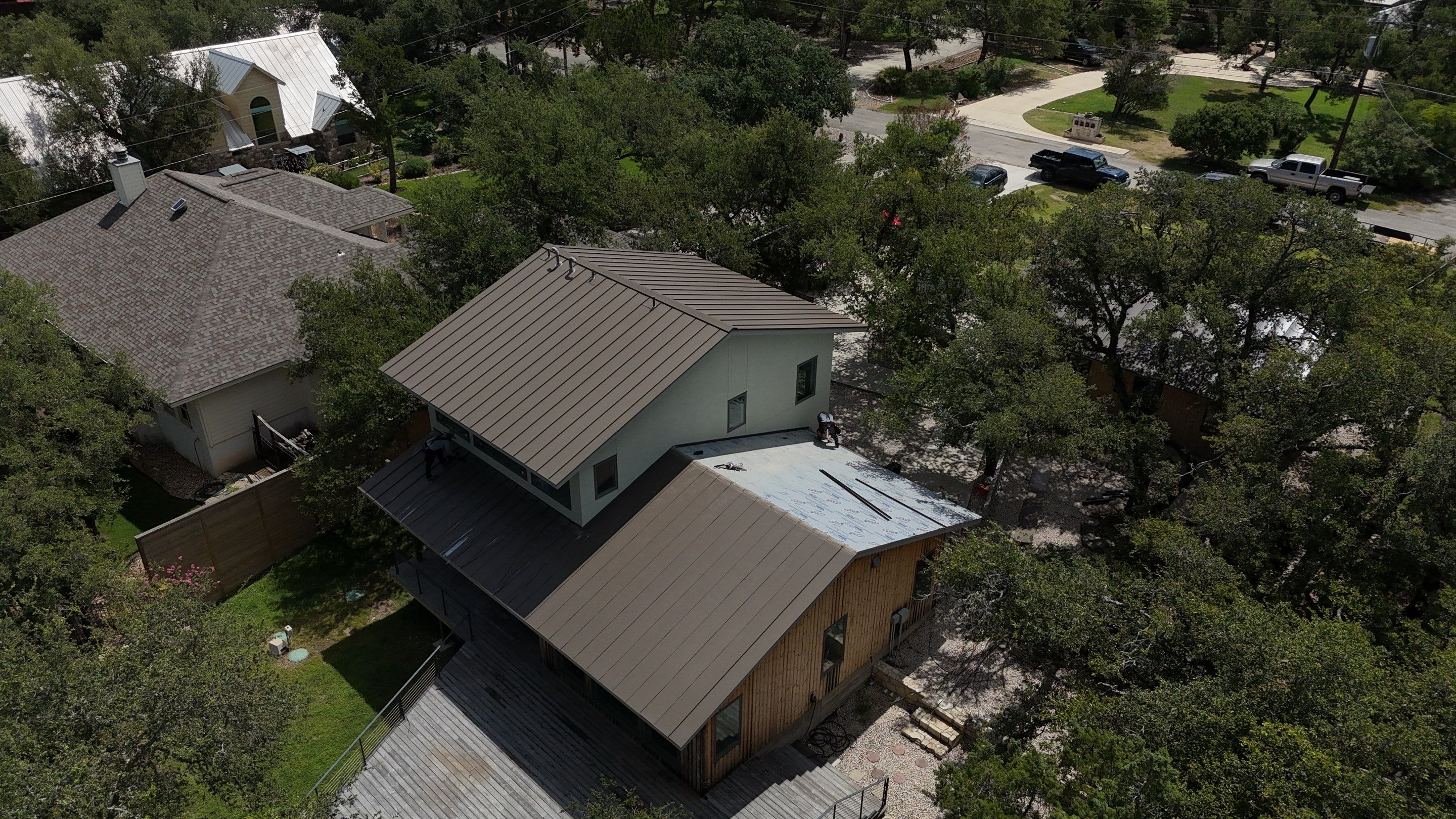 Residential Roof Replacement using 24 GA Double-Lock - Medium Bronze by Action Exteriors Austin