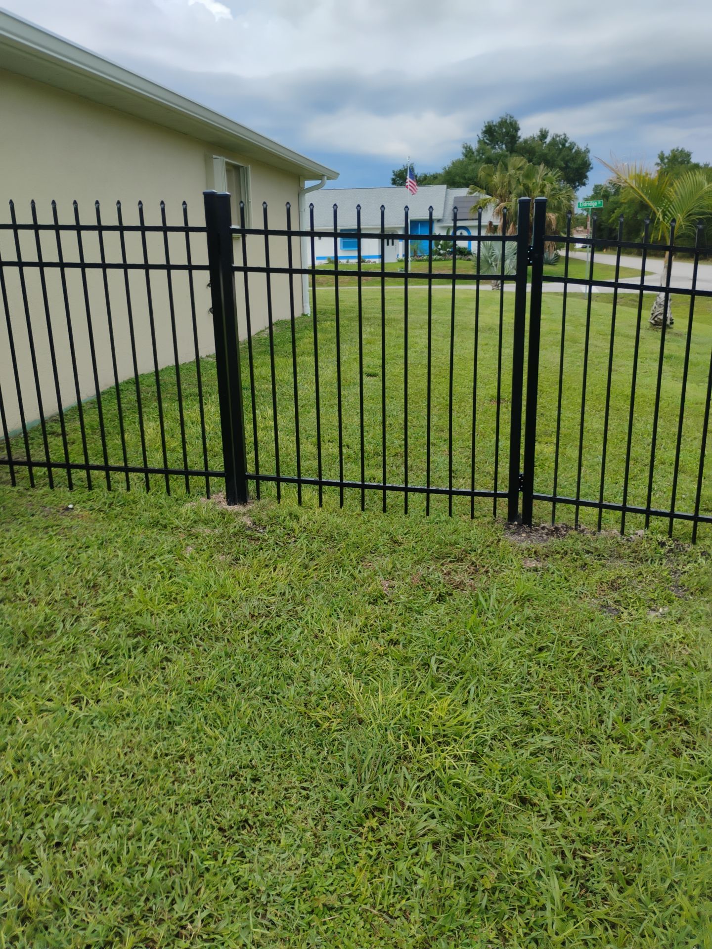 Black Aluminum Spear Top Picket Fence Installation in Englewood by True Fence LLC